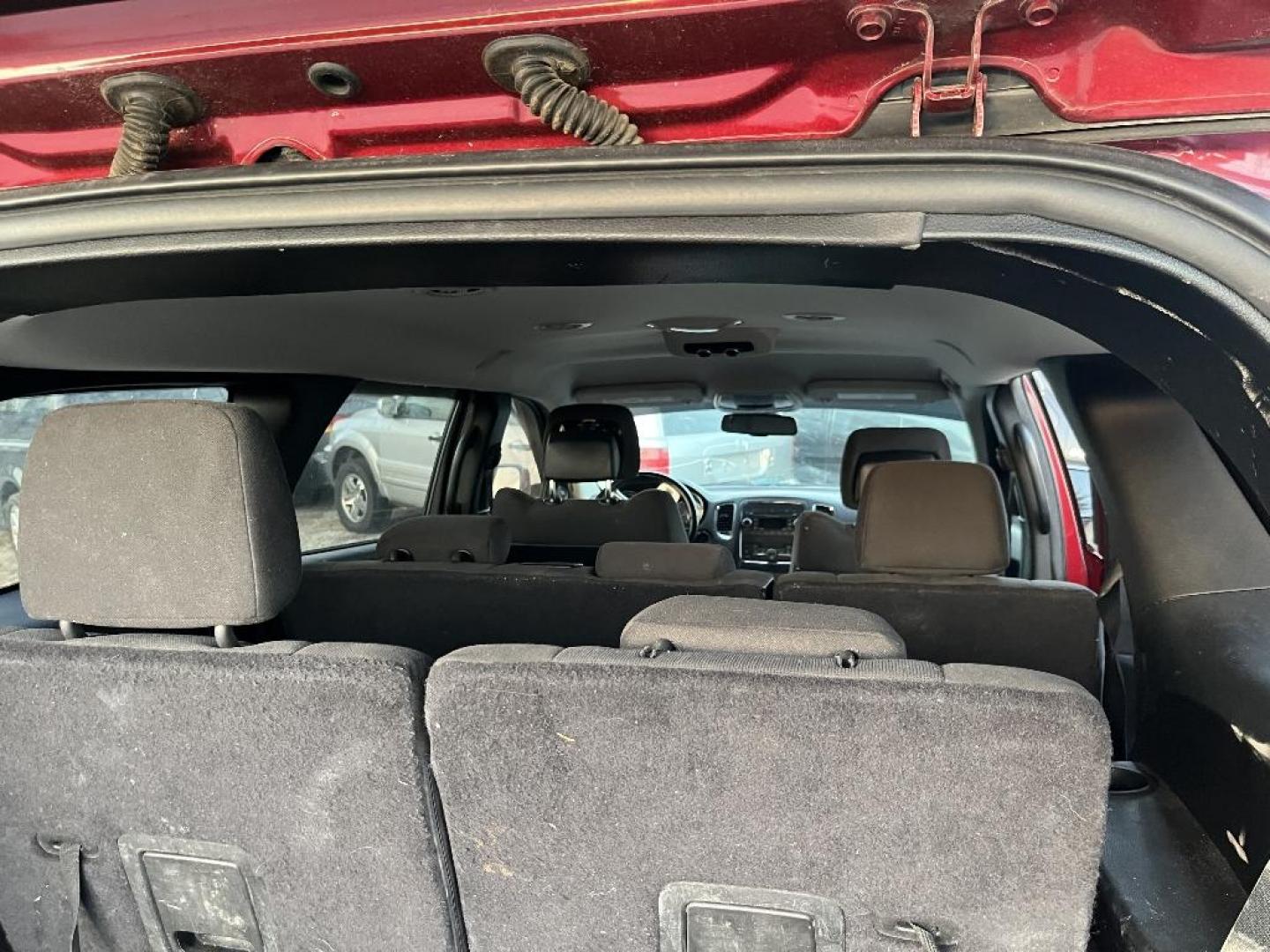 2013 RED DODGE DURANGO SXT RWD (1C4RDHAG4DC) with an 3.6L V6 DOHC 24V engine, AUTOMATIC transmission, located at 2303 West Mt. Houston, Houston, 77038, (281) 507-3956, 29.771597, -95.339569 - Photo#2