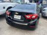 2018 BLACK CHEVROLET CRUZE LS Auto (1G1BC5SMXJ7) with an 1.4L L4 DOHC 16V TURBO engine, AUTOMATIC transmission, located at 2303 West Mt. Houston, Houston, 77038, (281) 507-3956, 29.771597, -95.339569 - Photo#2