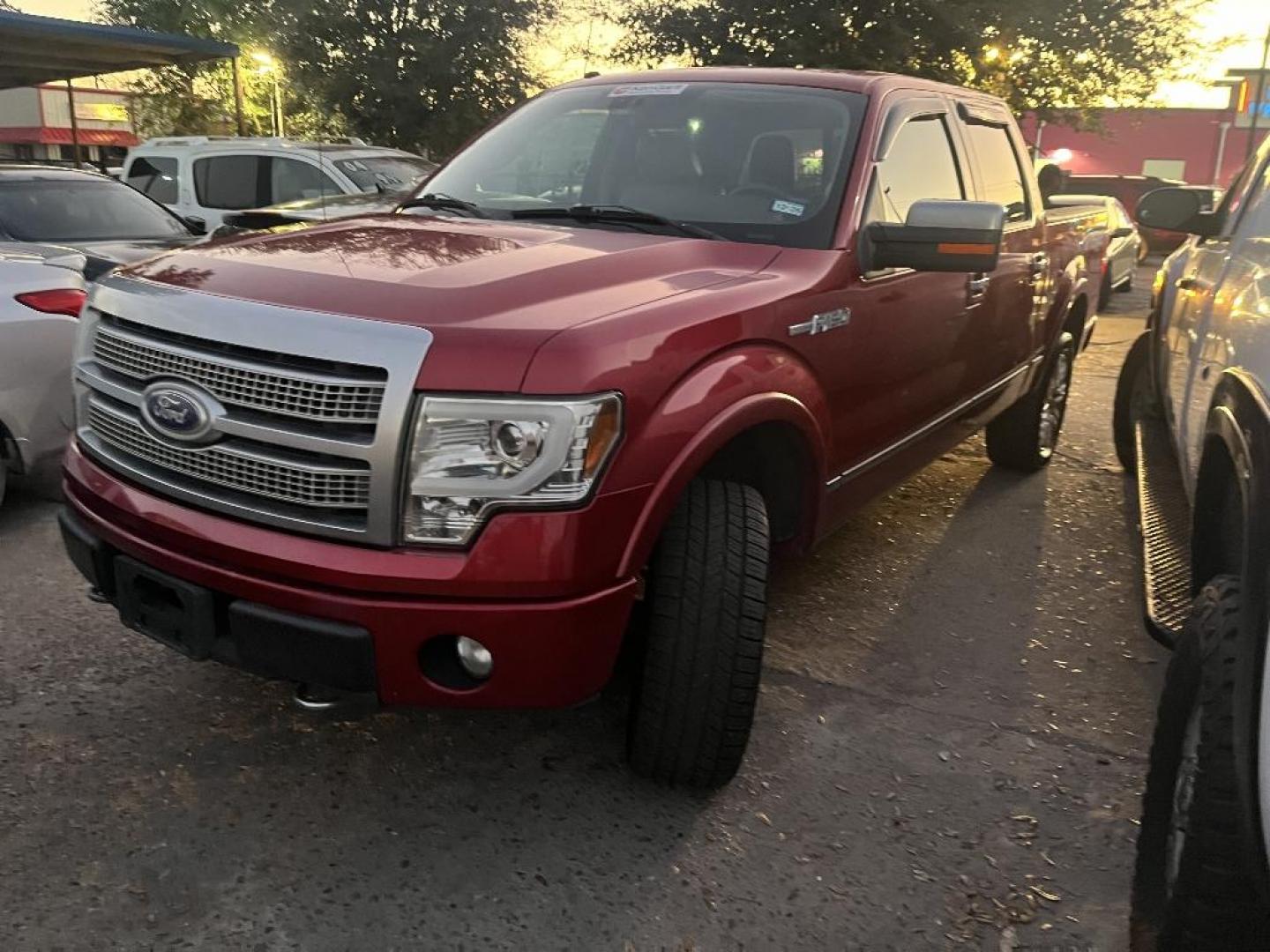 2010 RED FORD F-150 Lariat SuperCrew 5.5-ft. Bed 4WD (1FTFW1EV6AF) with an 5.4L V8 SOHC 24V FFV engine, AUTOMATIC transmission, located at 2303 West Mt. Houston, Houston, 77038, (281) 507-3956, 29.771597, -95.339569 - Photo#3