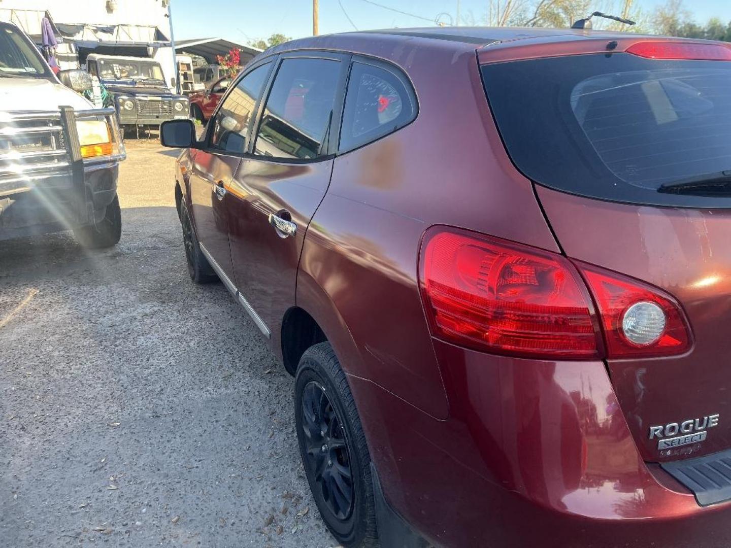 2015 RED NISSAN ROGUE SELECT S 2WD (JN8AS5MTXFW) with an 2.5L L4 DOHC 16V engine, AUTOMATIC transmission, located at 2303 West Mt. Houston, Houston, 77038, (281) 507-3956, 29.771597, -95.339569 - Photo#3