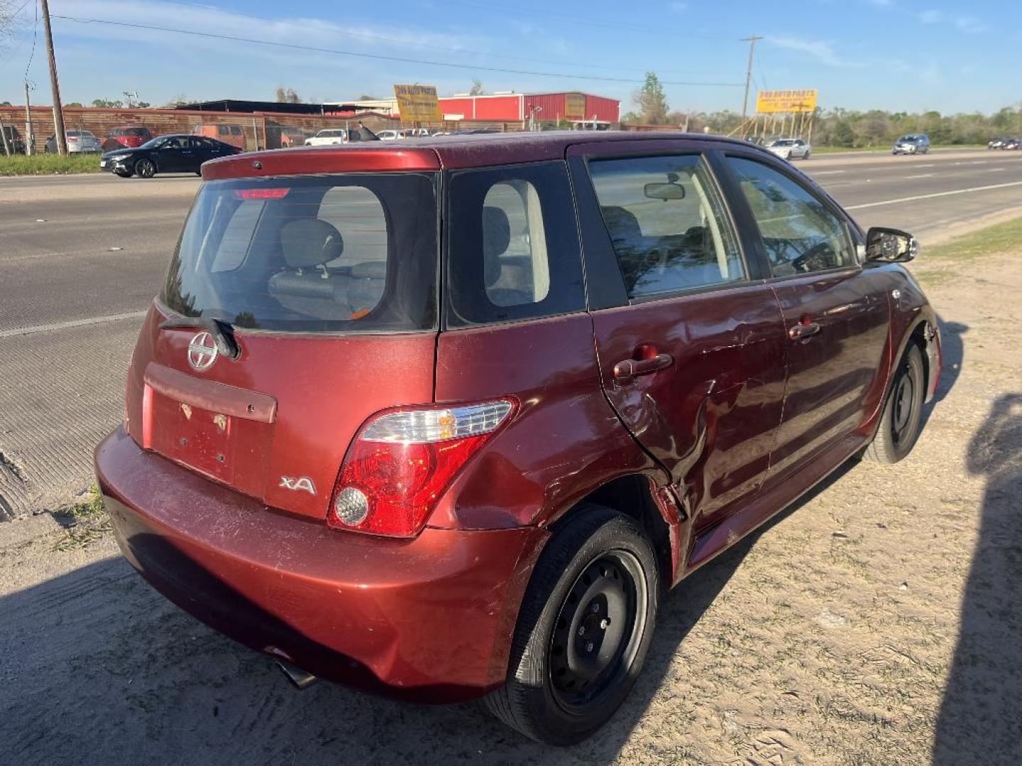 2006 RED SCION XA Hatchback (JTKKT624865) with an 1.5L L4 DOHC 16V engine, AUTOMATIC transmission, located at 2303 West Mt. Houston, Houston, 77038, (281) 507-3956, 29.771597, -95.339569 - Photo#2