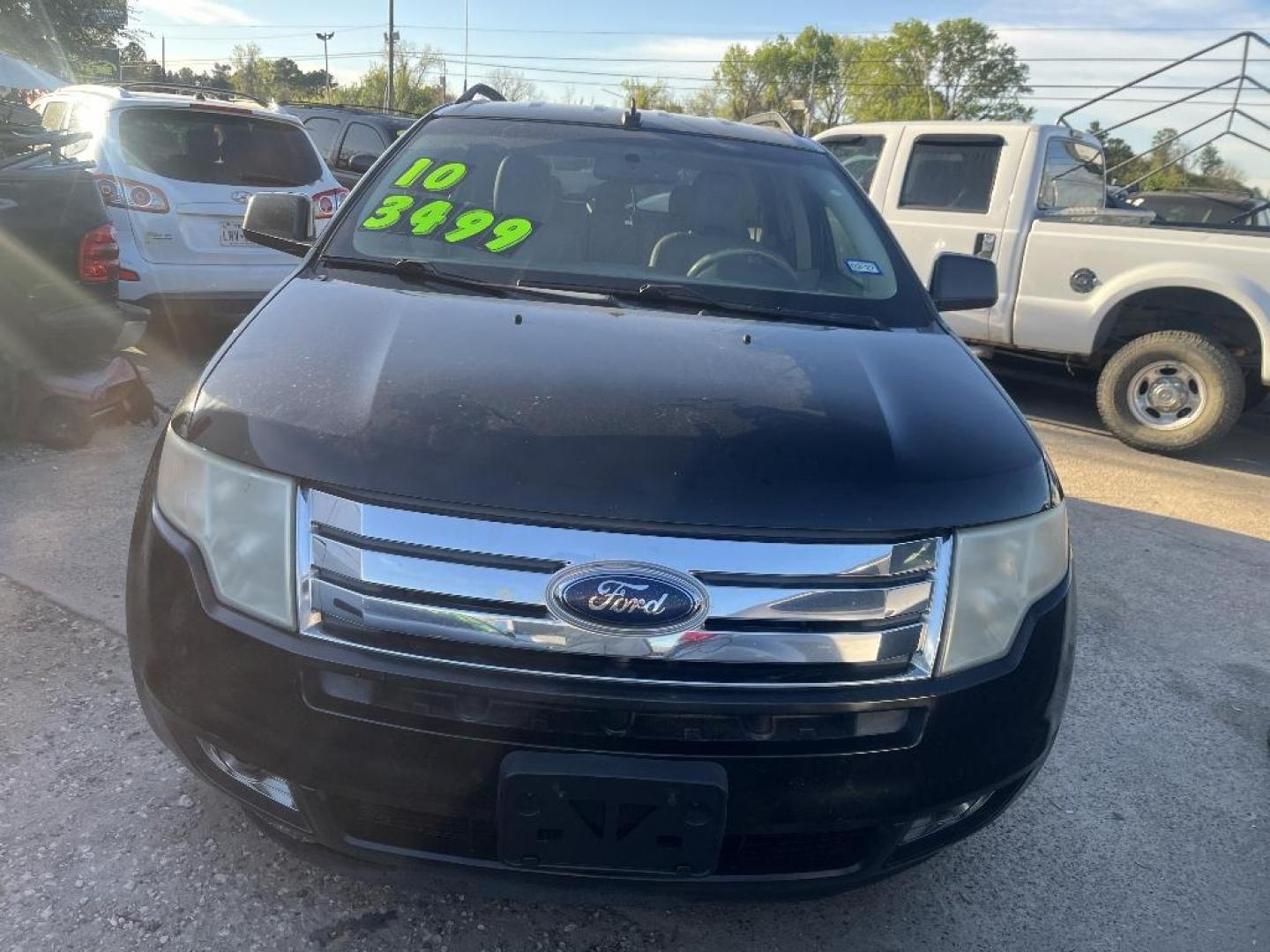 2010 BLACK FORD EDGE Limited FWD (2FMDK3KC2AB) with an 3.5L V6 DOHC 24V engine, AUTOMATIC transmission, located at 2303 West Mt. Houston, Houston, 77038, (281) 507-3956, 29.771597, -95.339569 - Photo#0