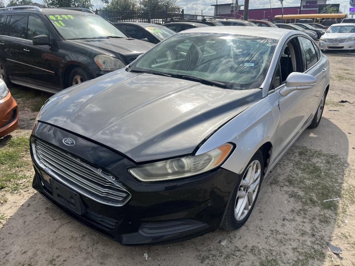 2014 GRAY FORD FUSION SE (3FA6P0H70ER) with an 2.5L L4 DOHC 16V engine, AUTOMATIC transmission, located at 2303 West Mt. Houston, Houston, 77038, (281) 507-3956, 29.771597, -95.339569 - Photo#0