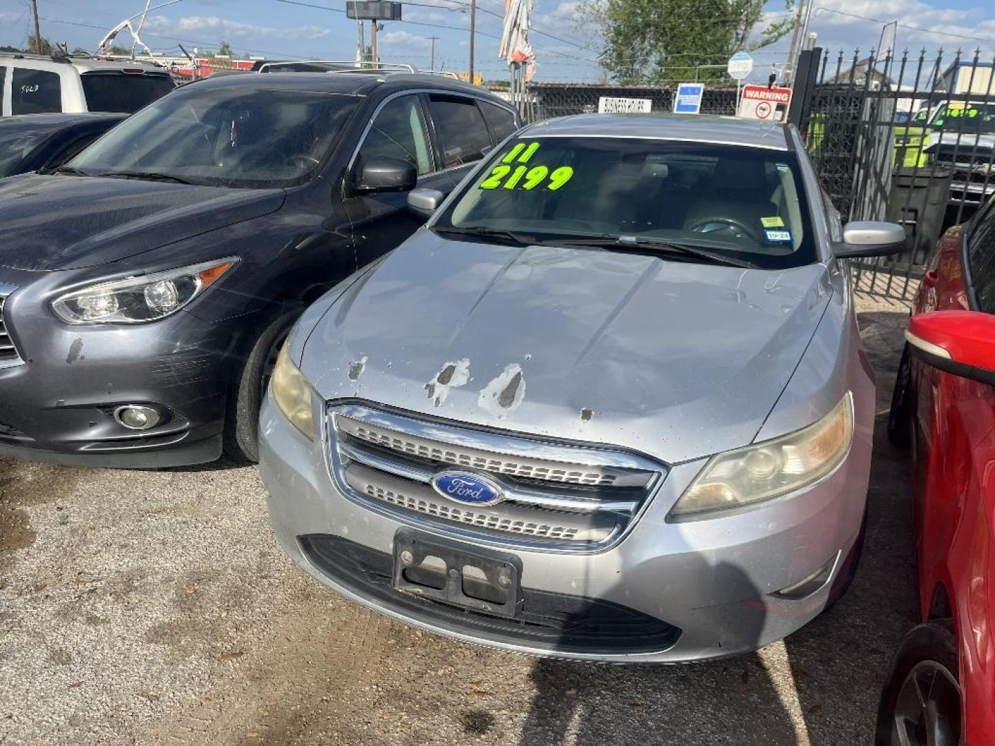2011 GRAY FORD TAURUS SEL FWD (1FAHP2EW5BG) with an 3.5L V6 DOHC 24V engine, AUTOMATIC transmission, located at 2303 West Mt. Houston, Houston, 77038, (281) 507-3956, 29.771597, -95.339569 - Photo#0