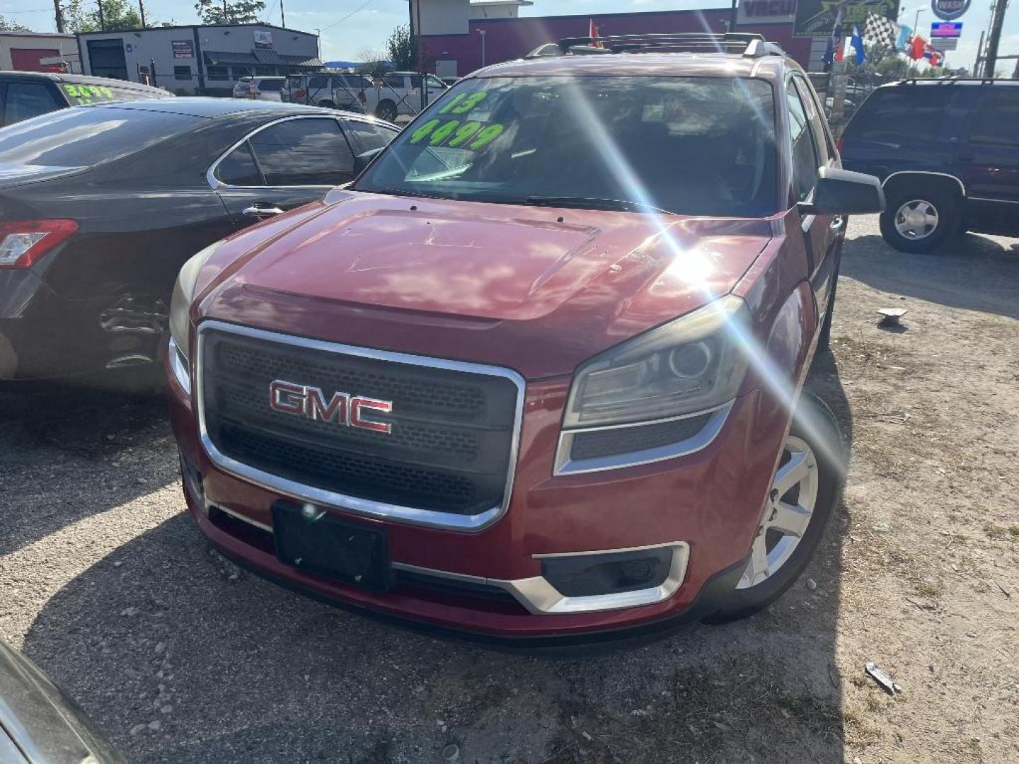 2013 RED GMC ACADIA SLE-2 FWD (1GKKRPKD0DJ) with an 3.6L V6 DOHC 24V engine, AUTOMATIC transmission, located at 2303 West Mt. Houston, Houston, 77038, (281) 507-3956, 29.771597, -95.339569 - Photo#0