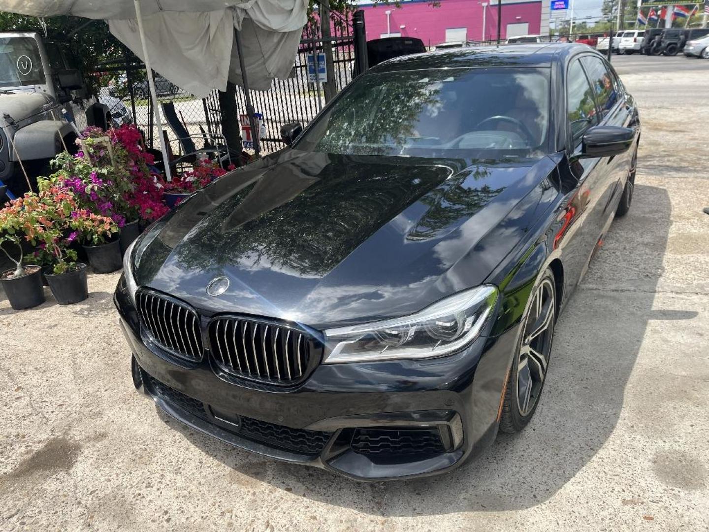 2019 BLACK BMW 7-SERIES 750i (WBA7F0C58KG) with an 4.8L V8 DOHC 32V engine, AUTOMATIC transmission, located at 2303 West Mt. Houston, Houston, 77038, (281) 507-3956, 29.771597, -95.339569 - Photo#5