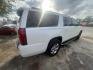 2019 WHITE CHEVROLET SUBURBAN Premier 2WD (1GNSCJKC1KR) with an 5.3L V8 OHV 16V engine, AUTOMATIC transmission, located at 2303 West Mt. Houston, Houston, 77038, (281) 507-3956, 29.771597, -95.339569 - Photo#4