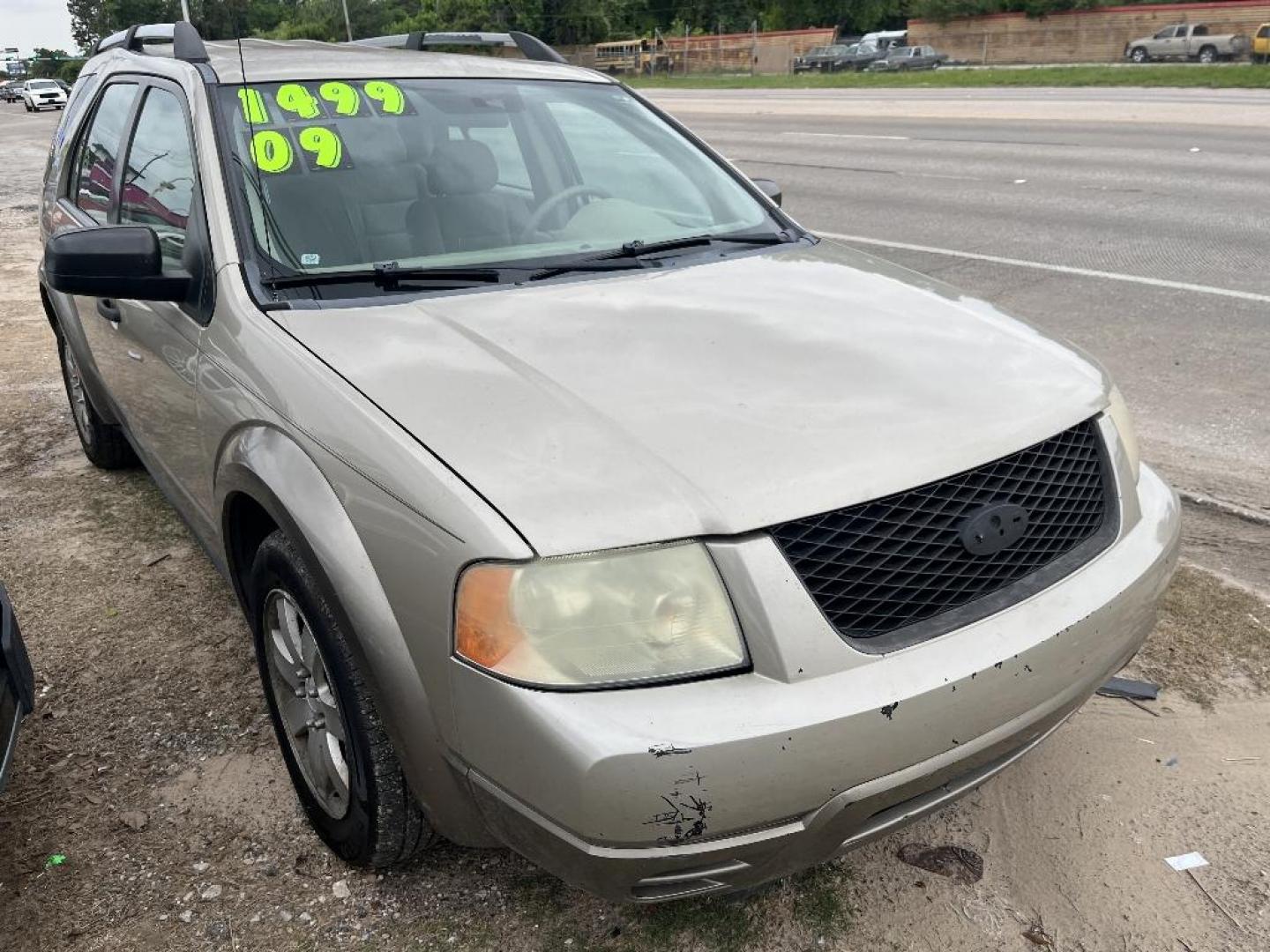 2006 BROWN FORD FREESTYLE SE (1FMZK01156G) with an 3.0L V6 DOHC 24V engine, AUTOMATIC transmission, located at 2303 West Mt. Houston, Houston, 77038, (281) 507-3956, 29.771597, -95.339569 - Photo#0