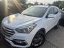 2017 WHITE HYUNDAI SANTA FE Sport 2.4 FWD (5NMZU3LB0HH) with an 2.4L L4 DOHC 16V engine, AUTOMATIC transmission, located at 2303 West Mt. Houston, Houston, 77038, (281) 507-3956, 29.771597, -95.339569 - Photo#0