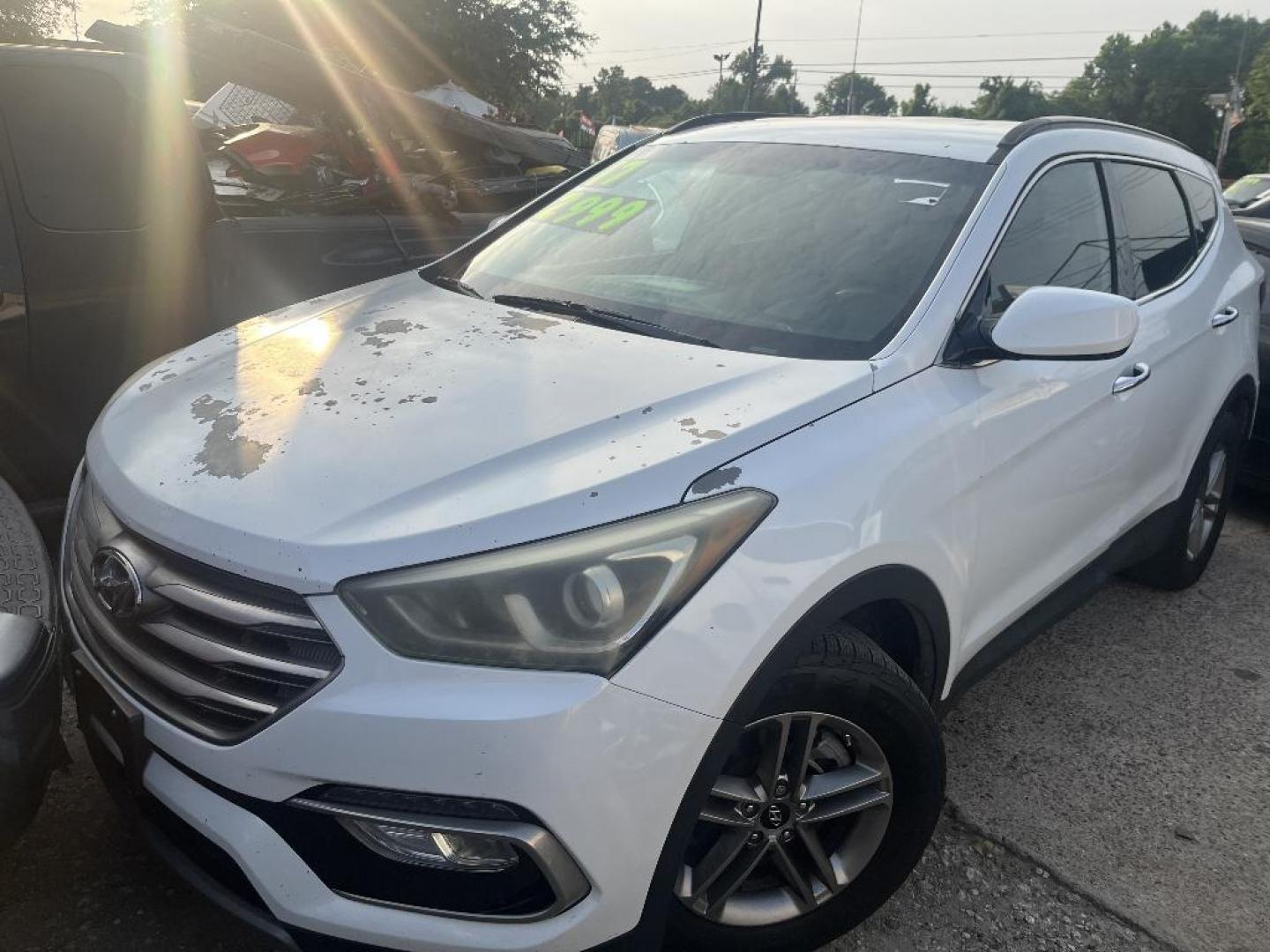 2017 WHITE HYUNDAI SANTA FE Sport 2.4 FWD (5NMZU3LB0HH) with an 2.4L L4 DOHC 16V engine, AUTOMATIC transmission, located at 2303 West Mt. Houston, Houston, 77038, (281) 507-3956, 29.771597, -95.339569 - Photo#1