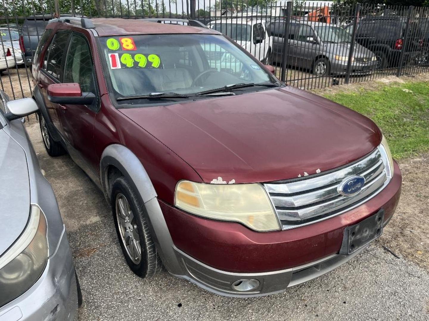 2008 RED FORD TAURUS X SEL FWD (1FMDK02W58G) with an 3.5L V6 DOHC 24V engine, AUTOMATIC transmission, located at 2303 West Mt. Houston, Houston, 77038, (281) 507-3956, 29.771597, -95.339569 - Photo#0
