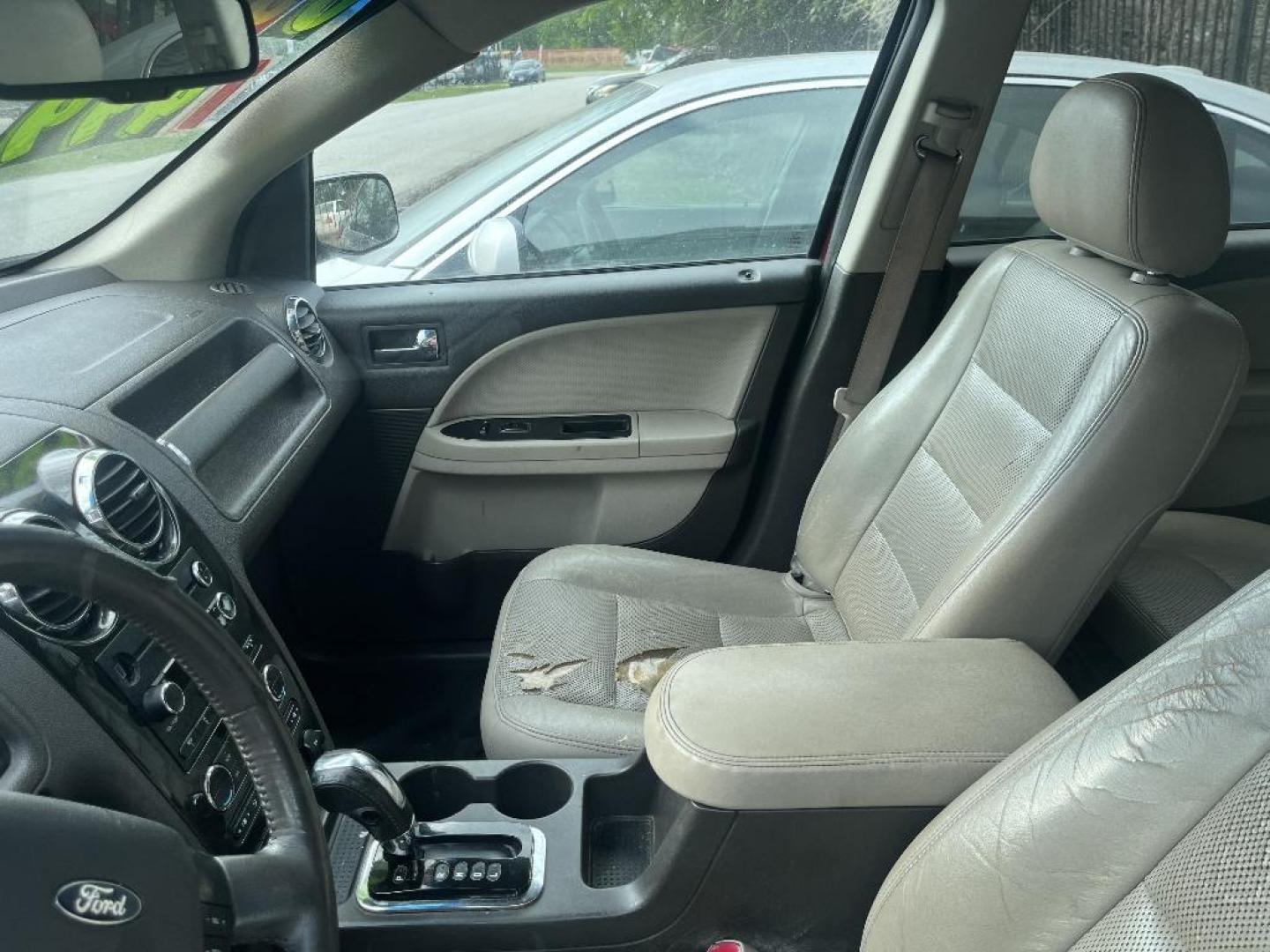 2008 RED FORD TAURUS X SEL FWD (1FMDK02W58G) with an 3.5L V6 DOHC 24V engine, AUTOMATIC transmission, located at 2303 West Mt. Houston, Houston, 77038, (281) 507-3956, 29.771597, -95.339569 - Photo#2