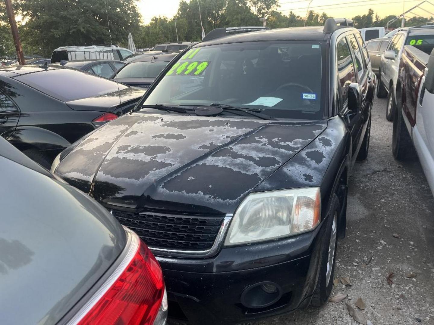 2011 BLACK MITSUBISHI ENDEAVOR LS 2WD (4A4JM2AS8BE) with an 3.8L V6 SOHC 24V engine, AUTOMATIC transmission, located at 2303 West Mt. Houston, Houston, 77038, (281) 507-3956, 29.771597, -95.339569 - Photo#1