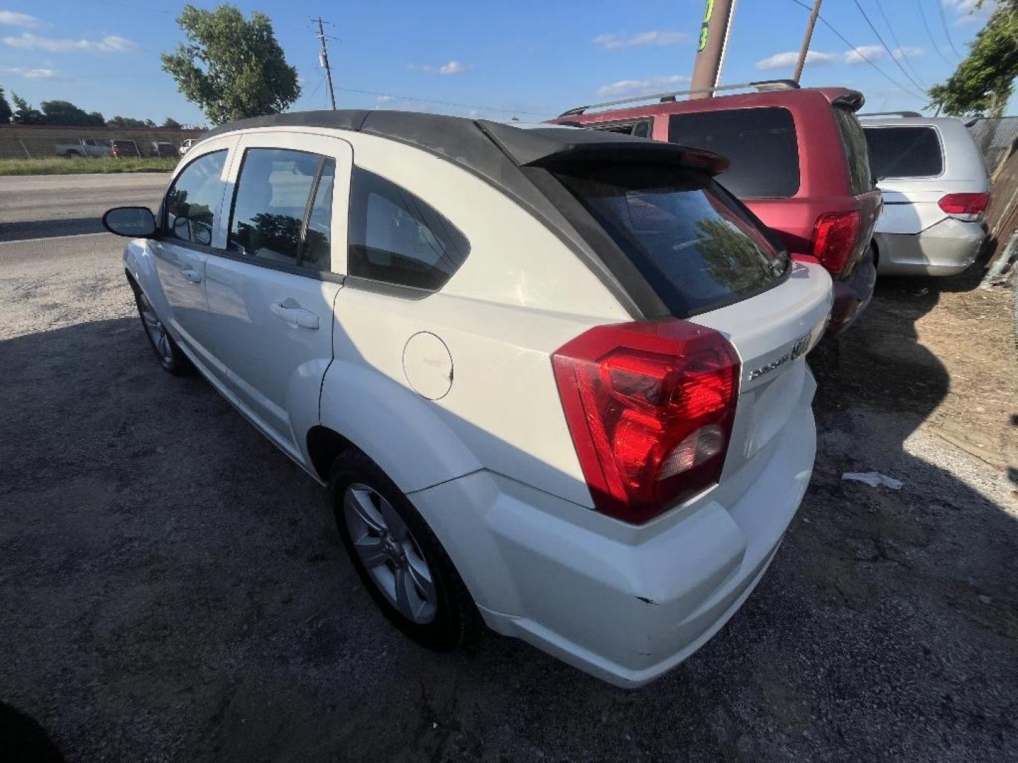 2010 WHITE DODGE CALIBER Express (1B3CB4HA1AD) with an 2.0L L4 DOHC 16V engine, AUTOMATIC transmission, located at 2303 West Mt. Houston, Houston, 77038, (281) 507-3956, 29.771597, -95.339569 - Photo#1