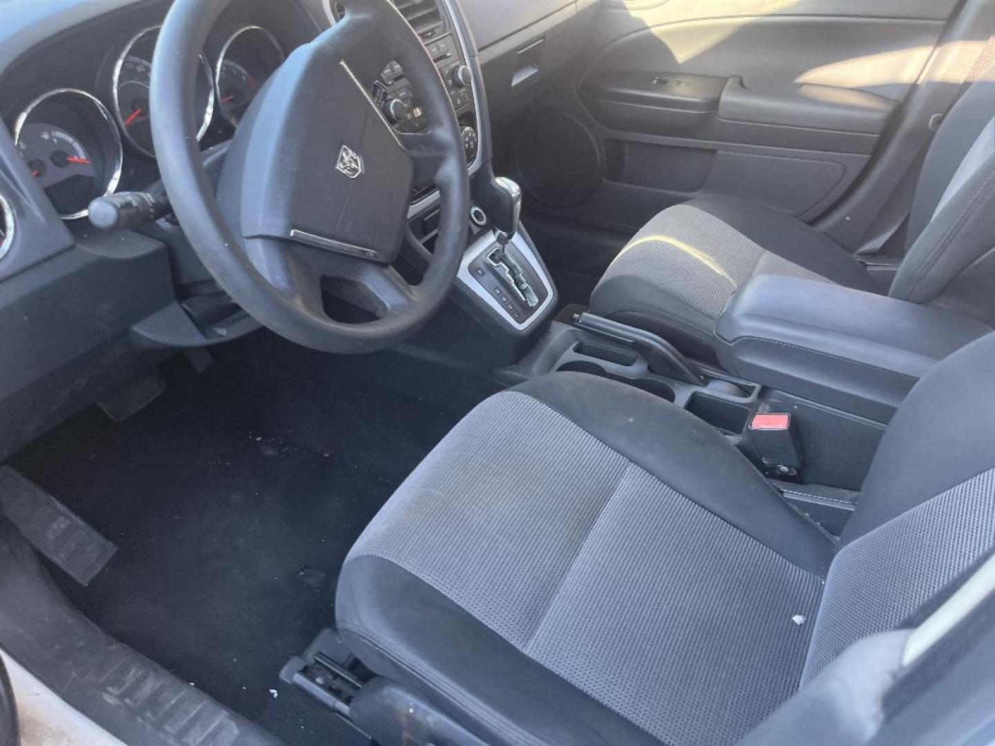 2010 WHITE DODGE CALIBER Express (1B3CB4HA1AD) with an 2.0L L4 DOHC 16V engine, AUTOMATIC transmission, located at 2303 West Mt. Houston, Houston, 77038, (281) 507-3956, 29.771597, -95.339569 - Photo#2