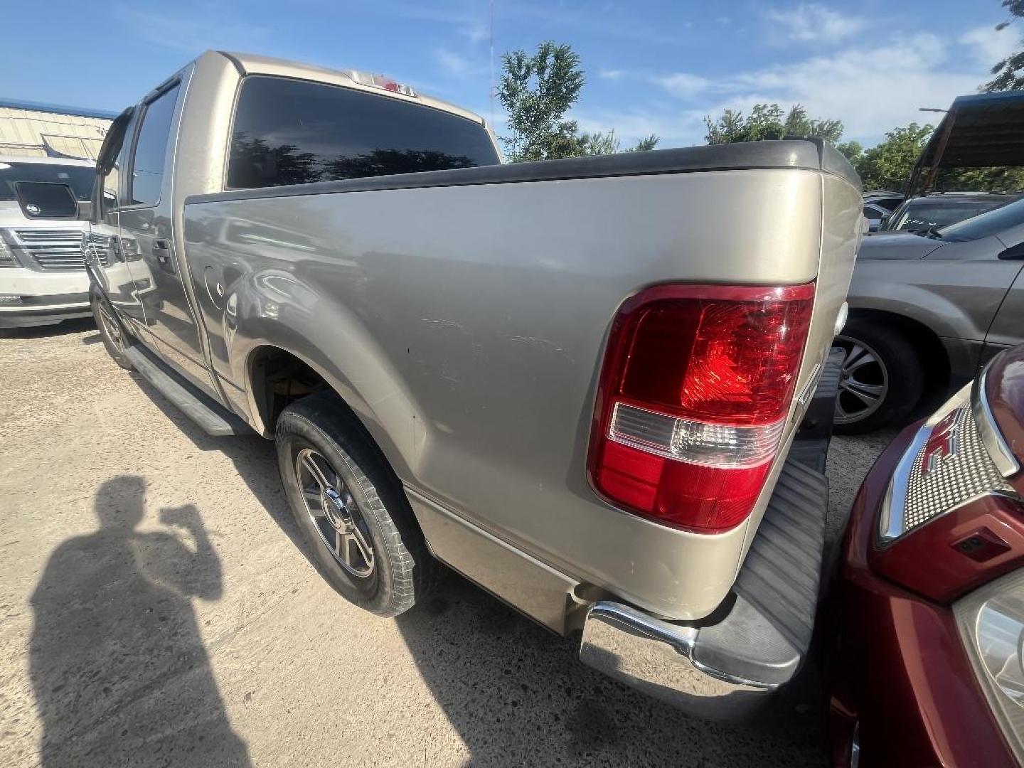 2007 BROWN FORD F-150 Lariat SuperCrew Short Box 2WD (1FTPW12V77F) with an 5.4L V8 SOHC 24V FFV engine, AUTOMATIC transmission, located at 2303 West Mt. Houston, Houston, 77038, (281) 507-3956, 29.771597, -95.339569 - Photo#1