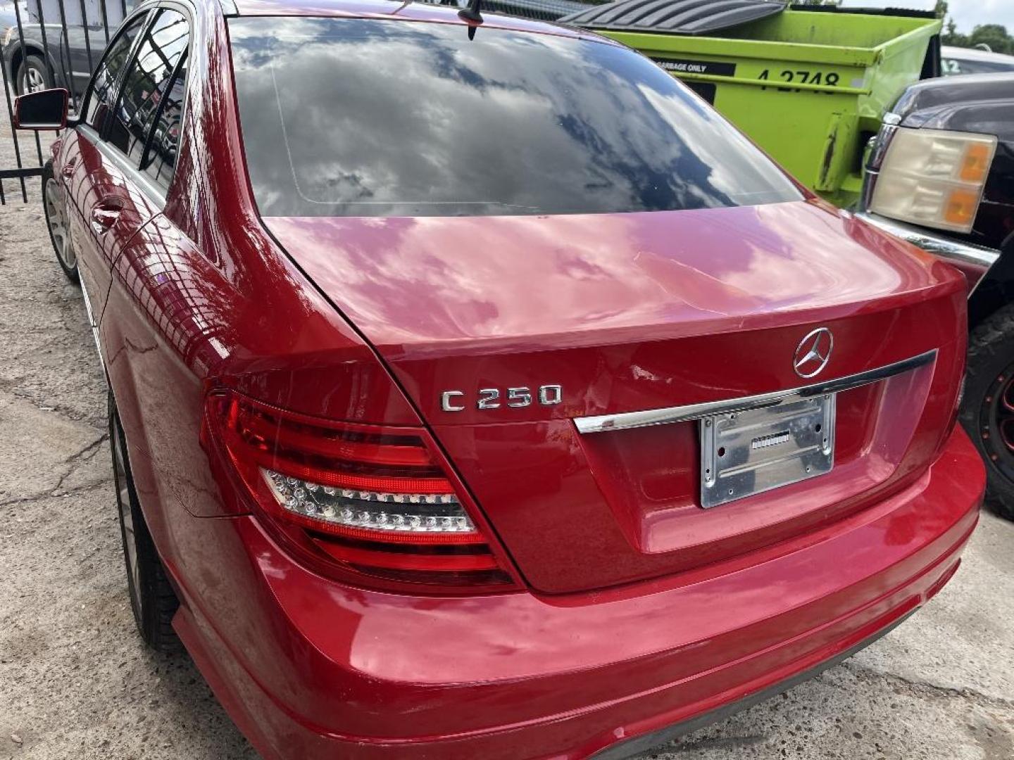 2014 RED MERCEDES-BENZ C-CLASS C250 Luxury Sedan (WDDGF4HB3ER) with an 1.8L L4 DOHC 16V engine, AUTOMATIC transmission, located at 2303 West Mt. Houston, Houston, 77038, (281) 507-3956, 29.771597, -95.339569 - Photo#4