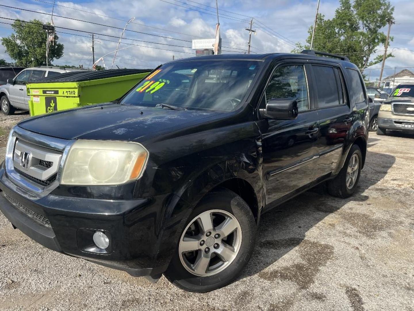 2011 BLUE HONDA PILOT EX-L 2WD 5-Spd AT with Navigation (5FNYF3H76BB) with an 3.5L V6 SOHC 24V engine, AUTOMATIC transmission, located at 2303 West Mt. Houston, Houston, 77038, (281) 507-3956, 29.771597, -95.339569 - Photo#0