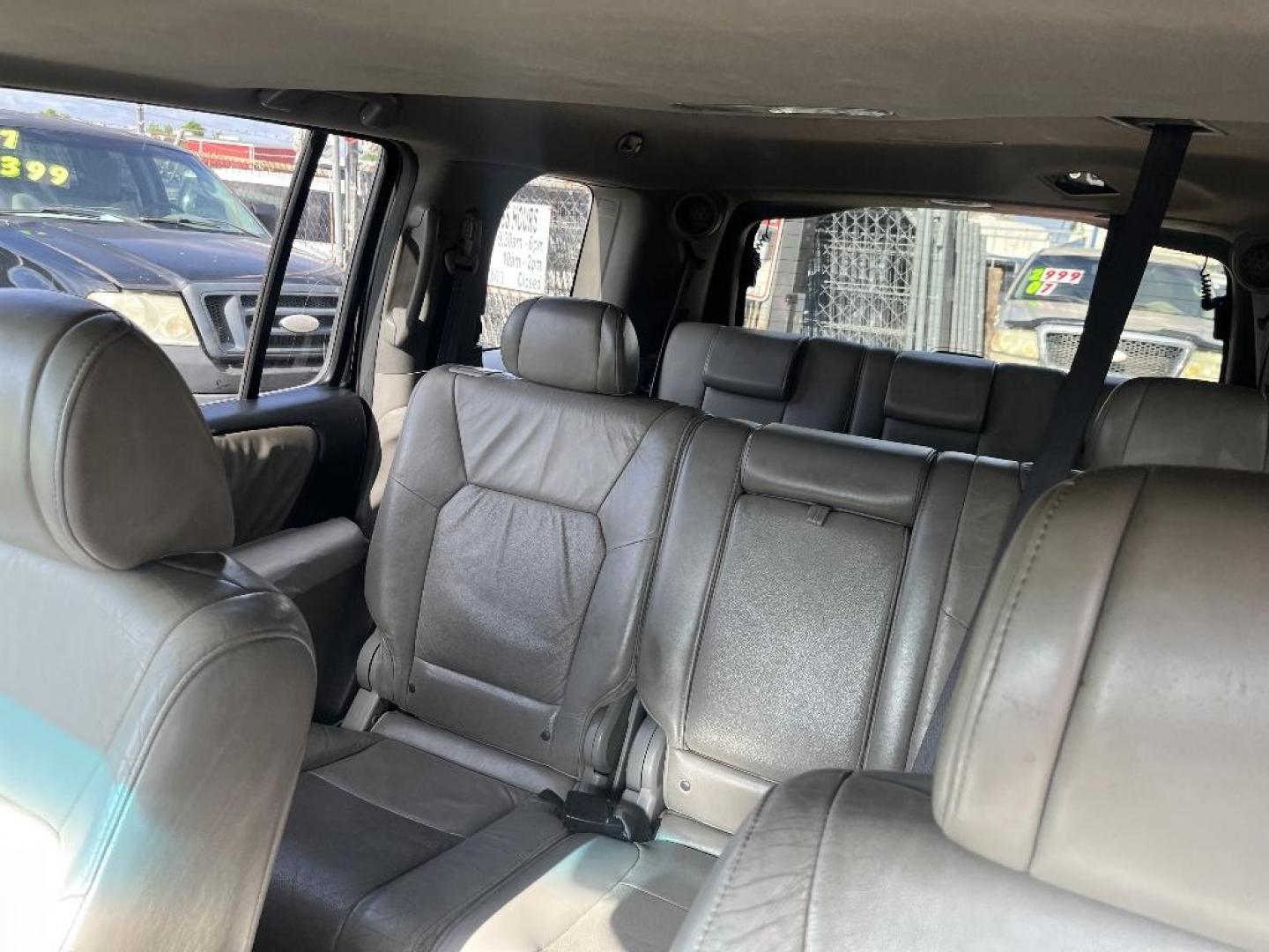 2011 BLUE HONDA PILOT EX-L 2WD 5-Spd AT with Navigation (5FNYF3H76BB) with an 3.5L V6 SOHC 24V engine, AUTOMATIC transmission, located at 2303 West Mt. Houston, Houston, 77038, (281) 507-3956, 29.771597, -95.339569 - Photo#2