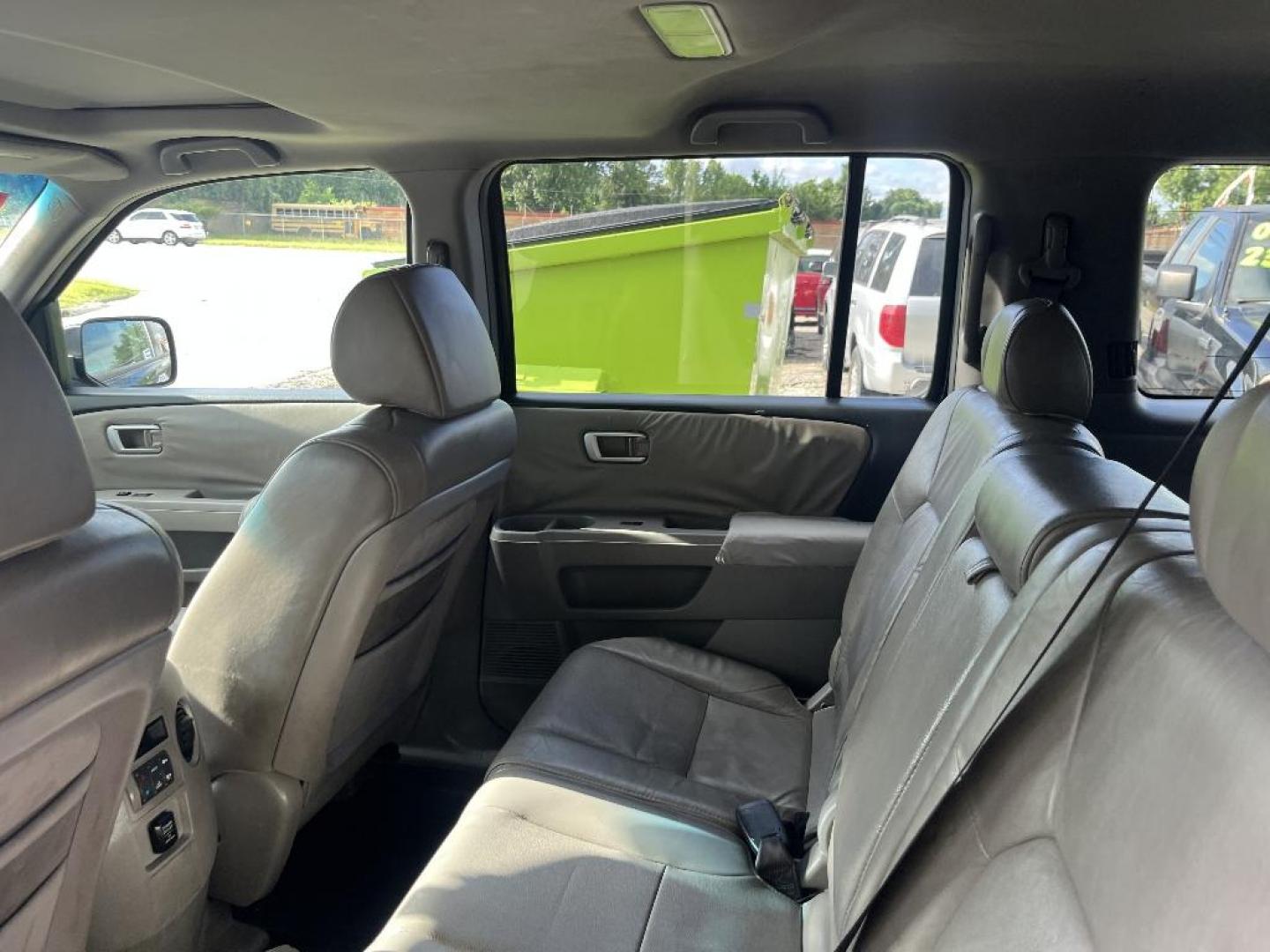 2011 BLUE HONDA PILOT EX-L 2WD 5-Spd AT with Navigation (5FNYF3H76BB) with an 3.5L V6 SOHC 24V engine, AUTOMATIC transmission, located at 2303 West Mt. Houston, Houston, 77038, (281) 507-3956, 29.771597, -95.339569 - Photo#4