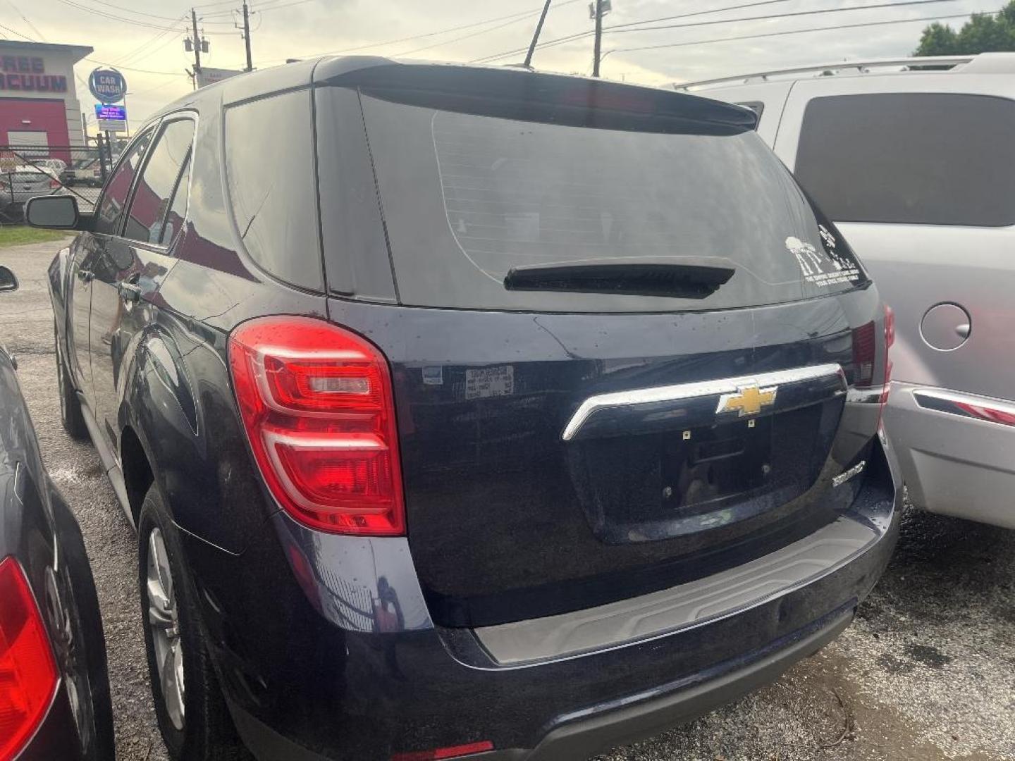 2016 BLUE CHEVROLET EQUINOX LS 2WD (2GNALBEKXG1) with an 2.4L L4 DOHC 16V FFV engine, AUTOMATIC transmission, located at 2303 West Mt. Houston, Houston, 77038, (281) 507-3956, 29.771597, -95.339569 - Photo#2