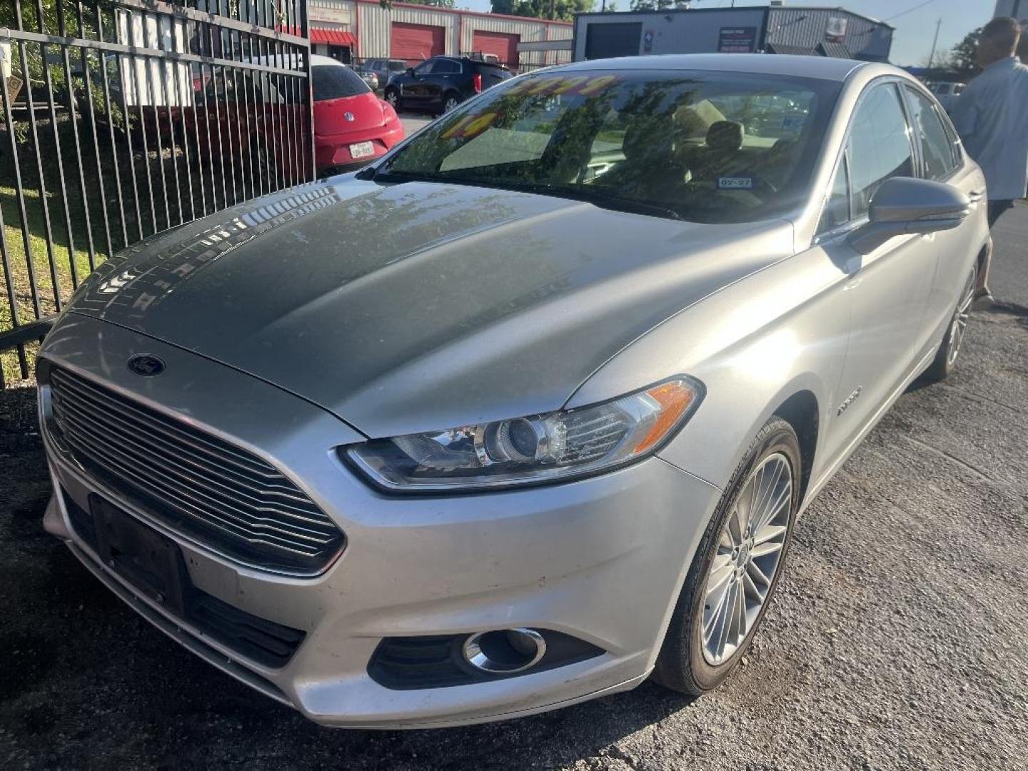 2014 GRAY FORD FUSION HYBRID SE (3FA6P0LU8ER) with an 2.0L L4 DOHC 16V HYBRID engine, AUTOMATIC transmission, located at 2303 West Mt. Houston, Houston, 77038, (281) 507-3956, 29.771597, -95.339569 - Photo#0