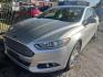 2014 GRAY FORD FUSION HYBRID SE (3FA6P0LU8ER) with an 2.0L L4 DOHC 16V HYBRID engine, AUTOMATIC transmission, located at 2303 West Mt. Houston, Houston, 77038, (281) 507-3956, 29.771597, -95.339569- Photo#0