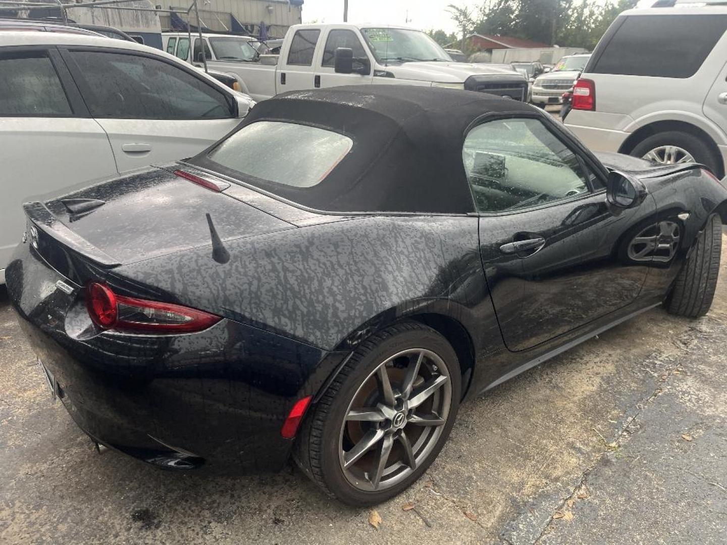 2016 BLACK MAZDA MX-5 MIATA Grand Touring 6AT (JM1NDAD76G0) with an 2.0L L4 DOHC 16V engine, AUTOMATIC transmission, located at 2303 West Mt. Houston, Houston, 77038, (281) 507-3956, 29.771597, -95.339569 - Photo#2