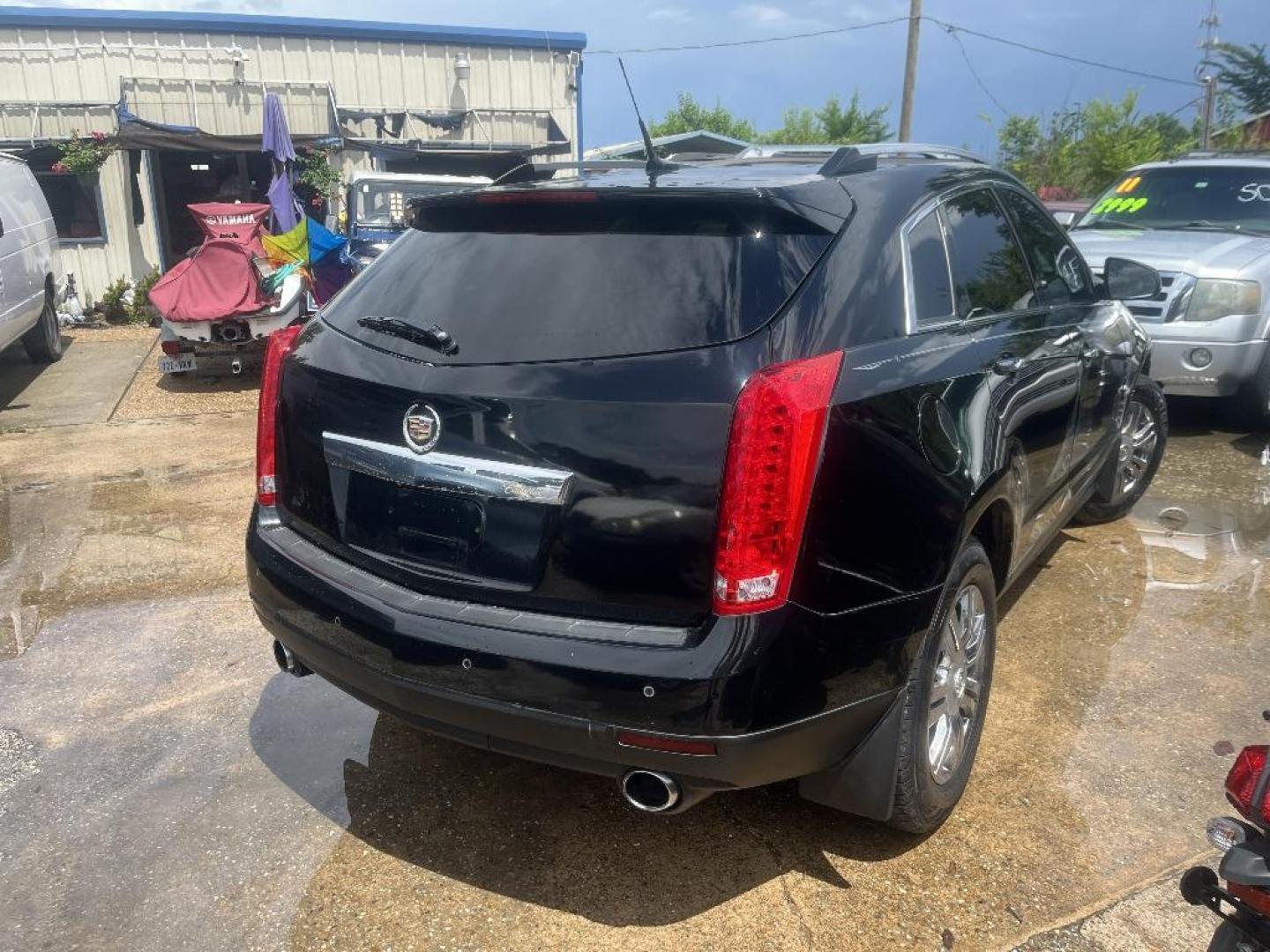 2011 BLACK CADILLAC SRX Luxury Collection (3GYFNAEY3BS) with an 3.0L V6 DOHC 24V engine, AUTOMATIC transmission, located at 2303 West Mt. Houston, Houston, 77038, (281) 507-3956, 29.771597, -95.339569 - Photo#1