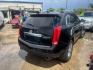 2011 BLACK CADILLAC SRX Luxury Collection (3GYFNAEY3BS) with an 3.0L V6 DOHC 24V engine, AUTOMATIC transmission, located at 2303 West Mt. Houston, Houston, 77038, (281) 507-3956, 29.771597, -95.339569 - Photo#1