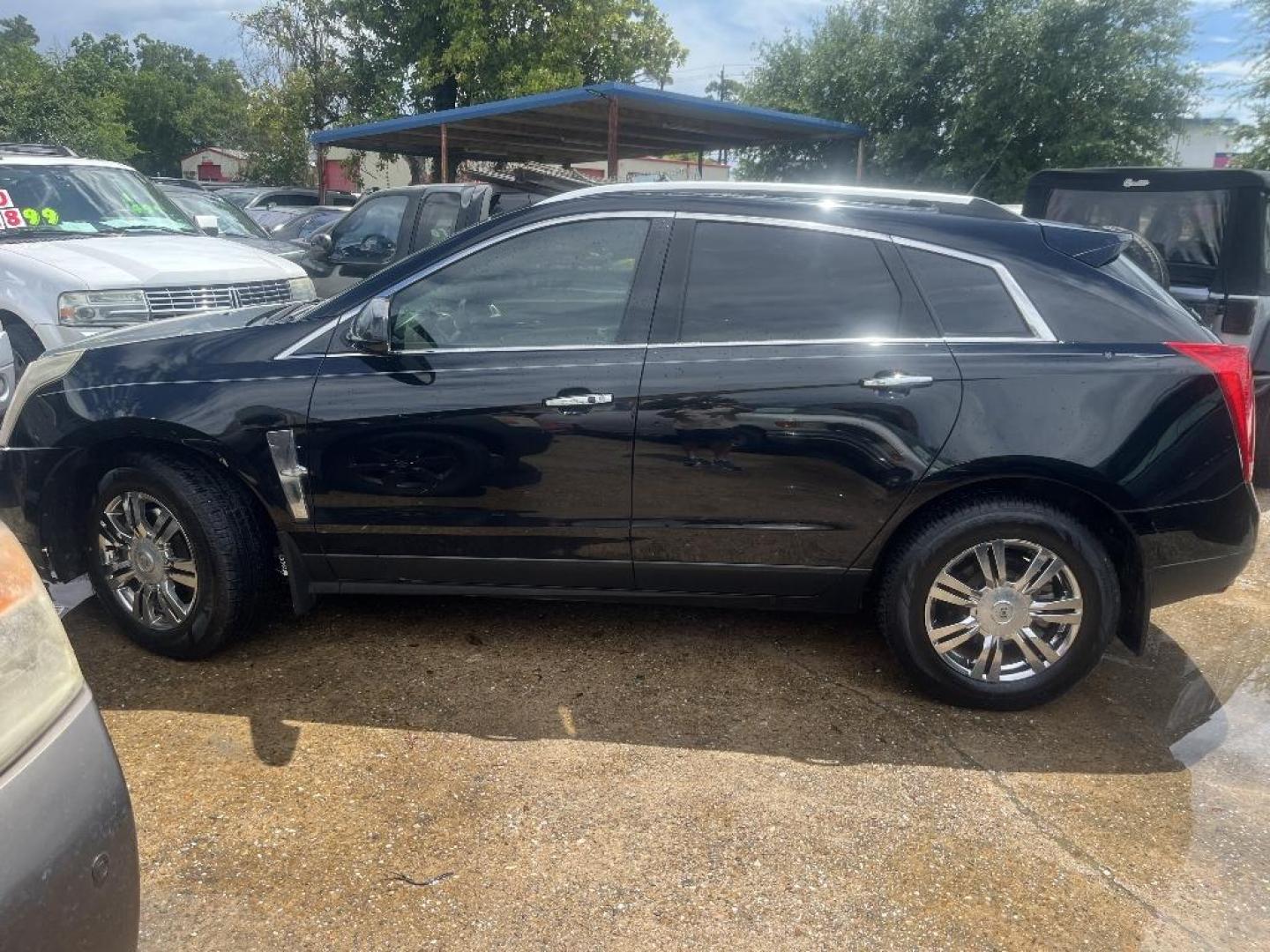 2011 BLACK CADILLAC SRX Luxury Collection (3GYFNAEY3BS) with an 3.0L V6 DOHC 24V engine, AUTOMATIC transmission, located at 2303 West Mt. Houston, Houston, 77038, (281) 507-3956, 29.771597, -95.339569 - Photo#2