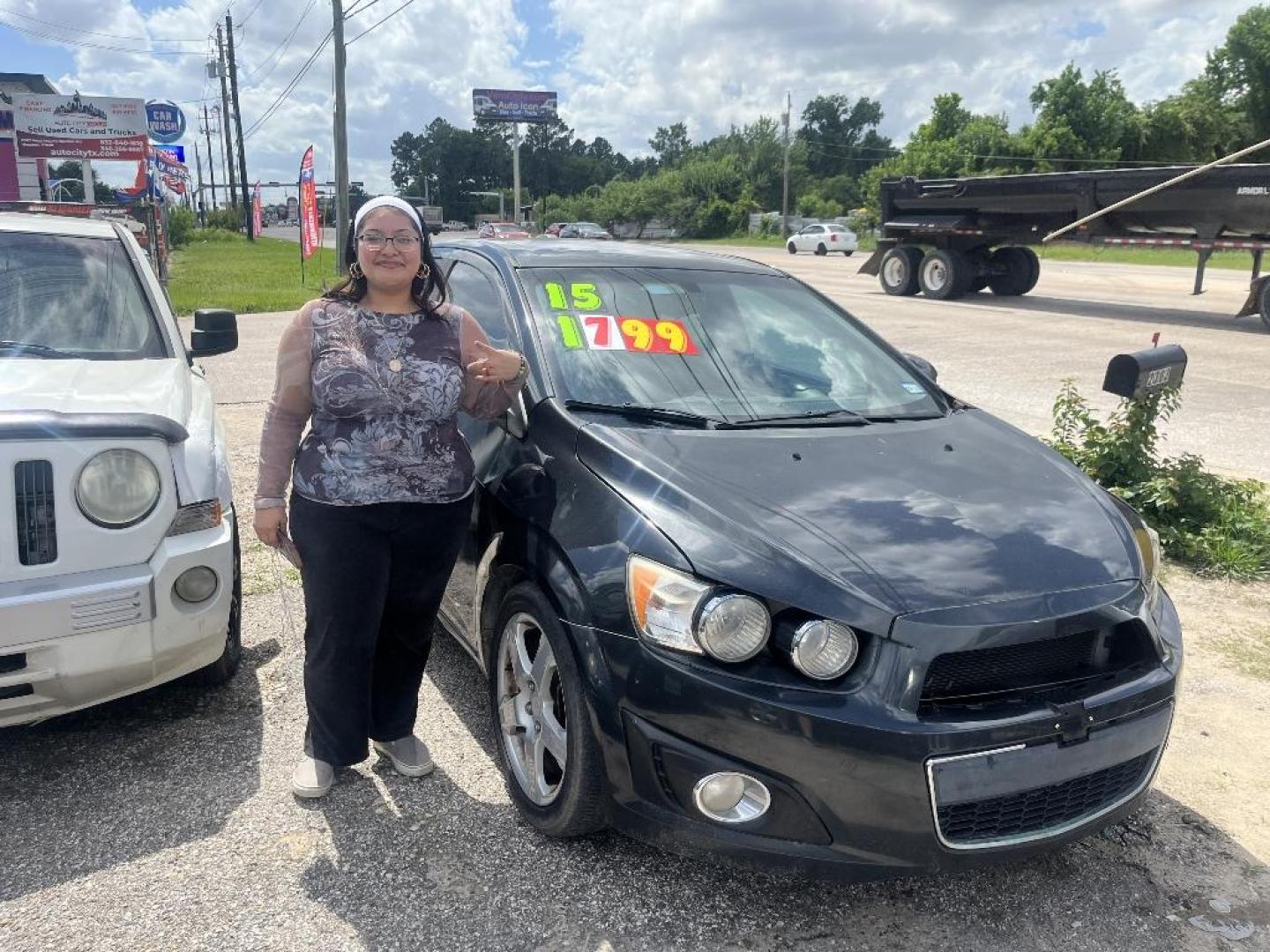 2015 BLACK CHEVROLET SONIC LTZ Auto Sedan (1G1JE5SBXF4) with an 1.4L L4 DOHC 24V TURBO engine, AUTOMATIC transmission, located at 2303 West Mt. Houston, Houston, 77038, (281) 507-3956, 29.771597, -95.339569 - Photo#2