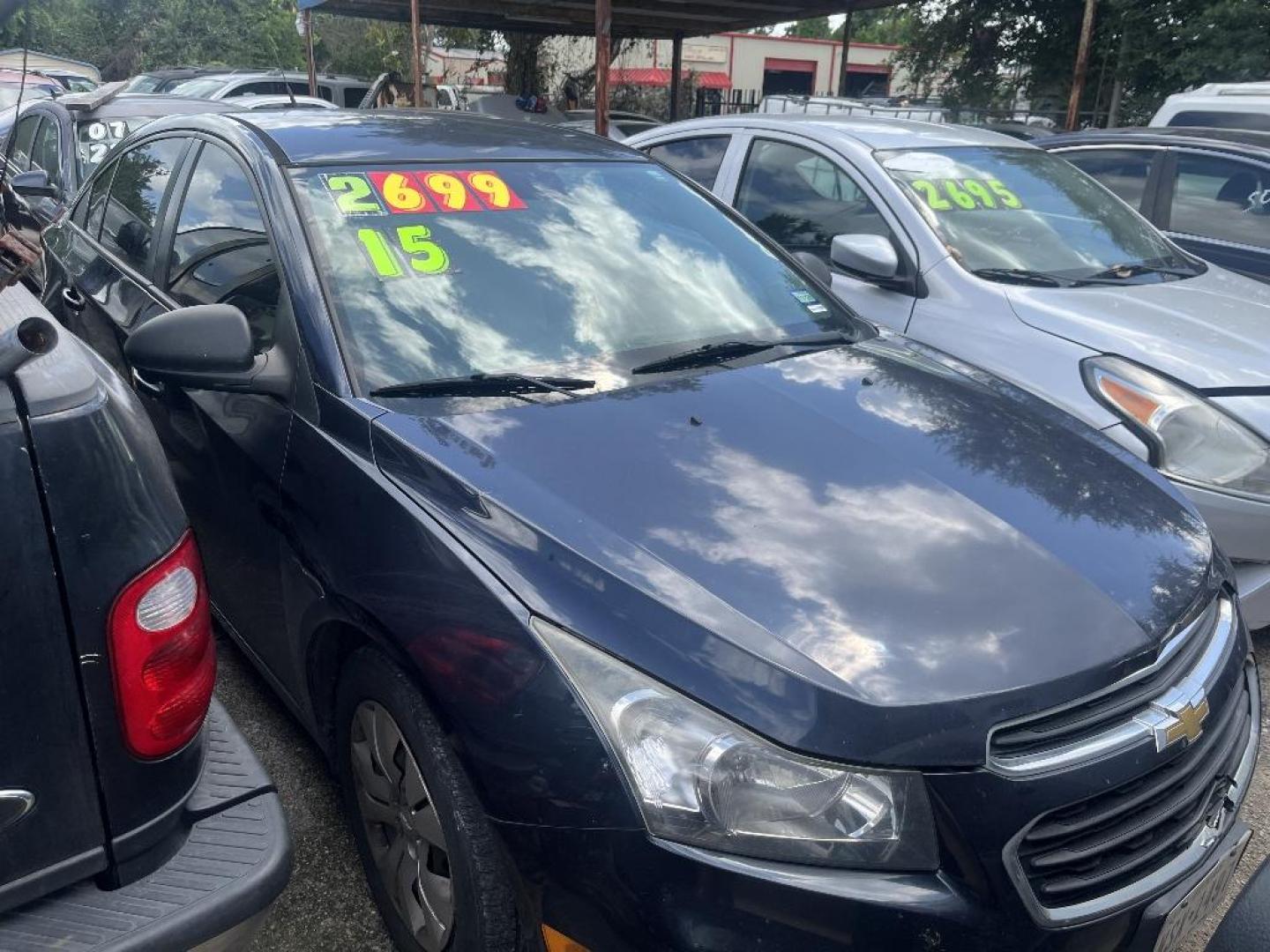 2015 BLUE CHEVROLET CRUZE LS Auto (1G1PA5SG8F7) with an 1.8L L4 DOHC 16V engine, AUTOMATIC transmission, located at 2303 West Mt. Houston, Houston, 77038, (281) 507-3956, 29.771597, -95.339569 - Photo#0