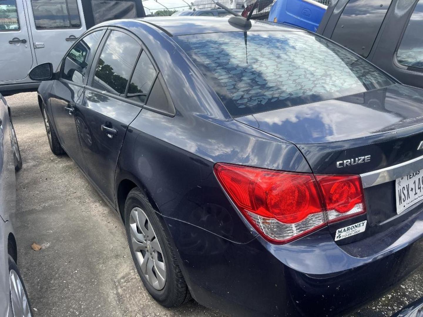 2015 BLUE CHEVROLET CRUZE LS Auto (1G1PA5SG8F7) with an 1.8L L4 DOHC 16V engine, AUTOMATIC transmission, located at 2303 West Mt. Houston, Houston, 77038, (281) 507-3956, 29.771597, -95.339569 - Photo#2