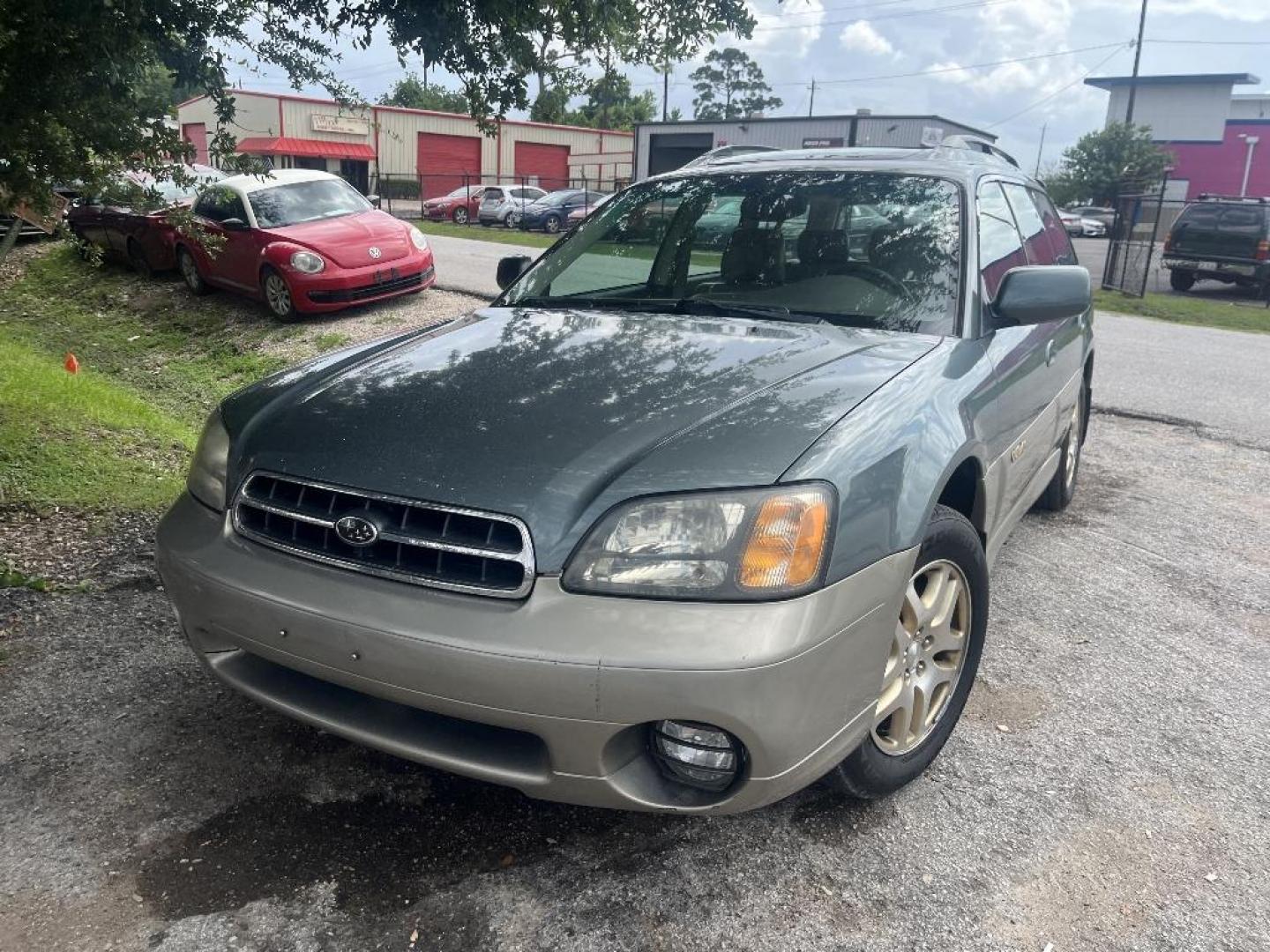 2001 BROWN SUBARU OUTBACK Limited Wagon (4S3BH686017) with an 2.5L H4 SOHC 16V engine, AUTOMATIC transmission, located at 2303 West Mt. Houston, Houston, 77038, (281) 507-3956, 29.771597, -95.339569 - Photo#0