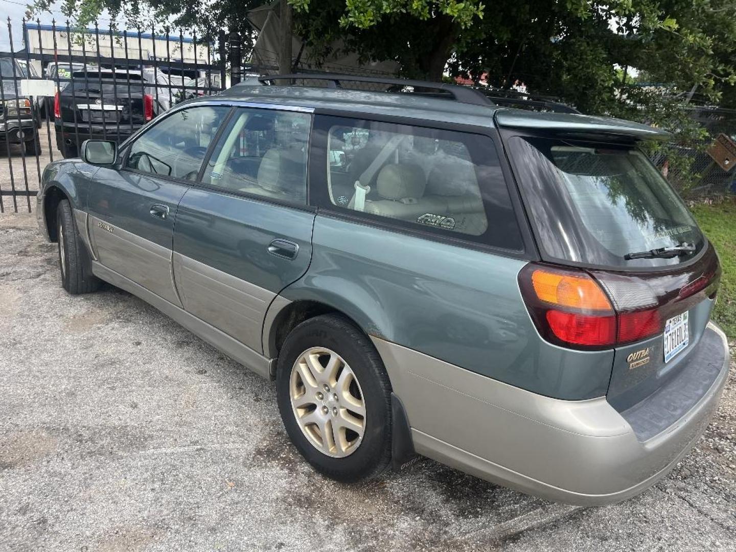 2001 BROWN SUBARU OUTBACK Limited Wagon (4S3BH686017) with an 2.5L H4 SOHC 16V engine, AUTOMATIC transmission, located at 2303 West Mt. Houston, Houston, 77038, (281) 507-3956, 29.771597, -95.339569 - Photo#1