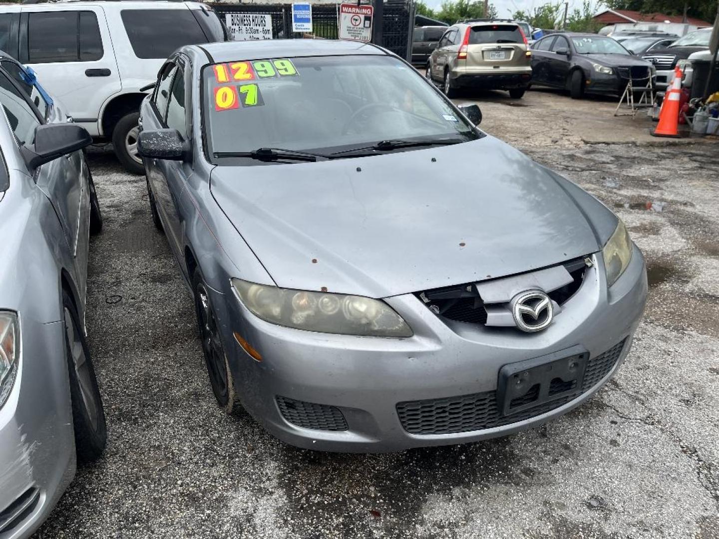 2007 GRAY MAZDA MAZDA6 i Sports Sedan Grand Touring (1YVHP80CX75) with an 2.3L L4 DOHC 16V engine, AUTOMATIC transmission, located at 2303 West Mt. Houston, Houston, 77038, (281) 507-3956, 29.771597, -95.339569 - Photo#0