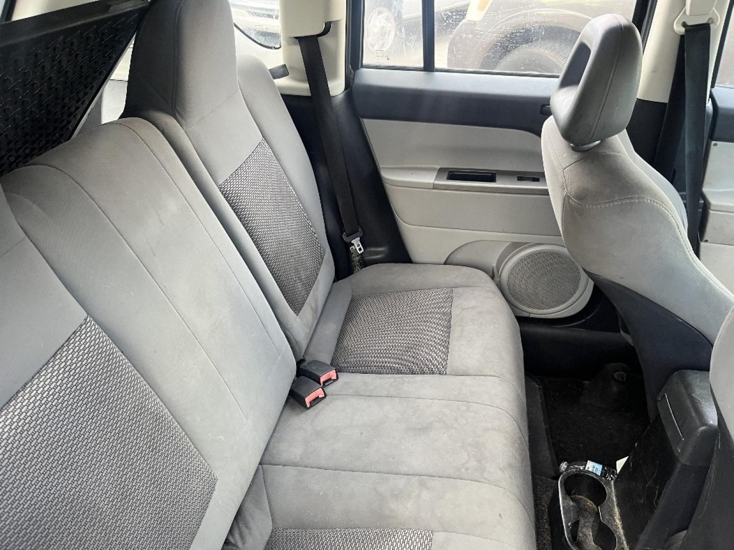 2007 BLACK JEEP COMPASS Sport 2WD (1J8FT47W97D) with an 2.4L L4 DOHC 16V engine, AUTOMATIC transmission, located at 2303 West Mt. Houston, Houston, 77038, (281) 507-3956, 29.771597, -95.339569- Photo#2