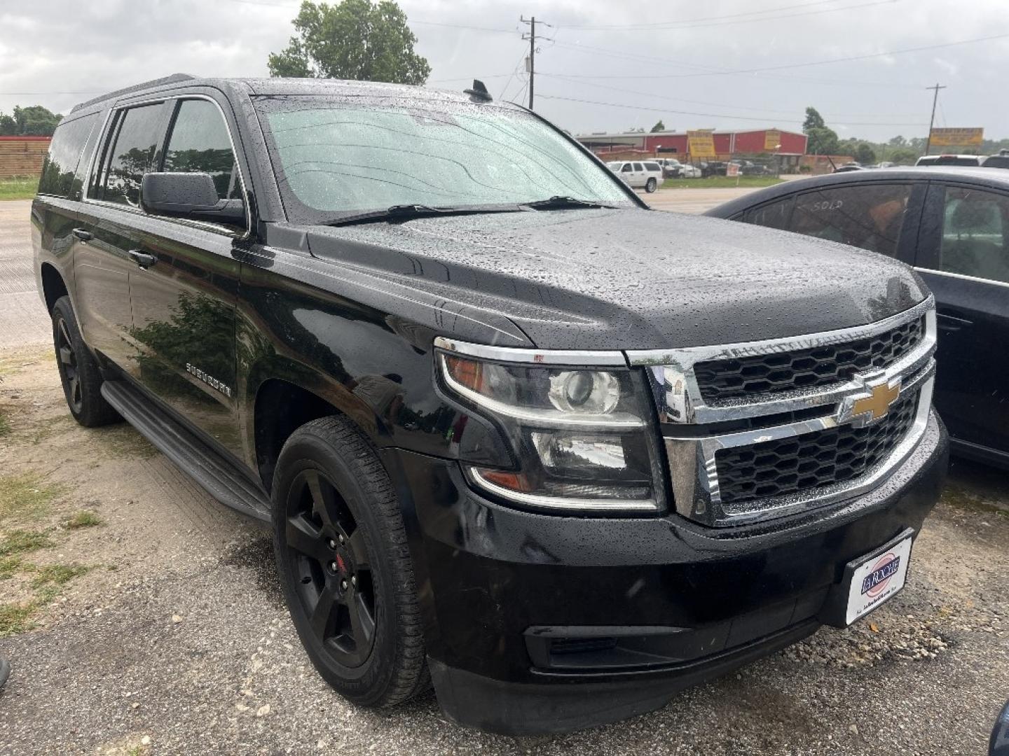 2020 BLACK CHEVROLET SUBURBAN LT 4WD (1GNSKHKC1LR) with an 5.3L V8 OHV 16V engine, AUTOMATIC transmission, located at 2303 West Mt. Houston, Houston, 77038, (281) 507-3956, 29.771597, -95.339569- Photo#0