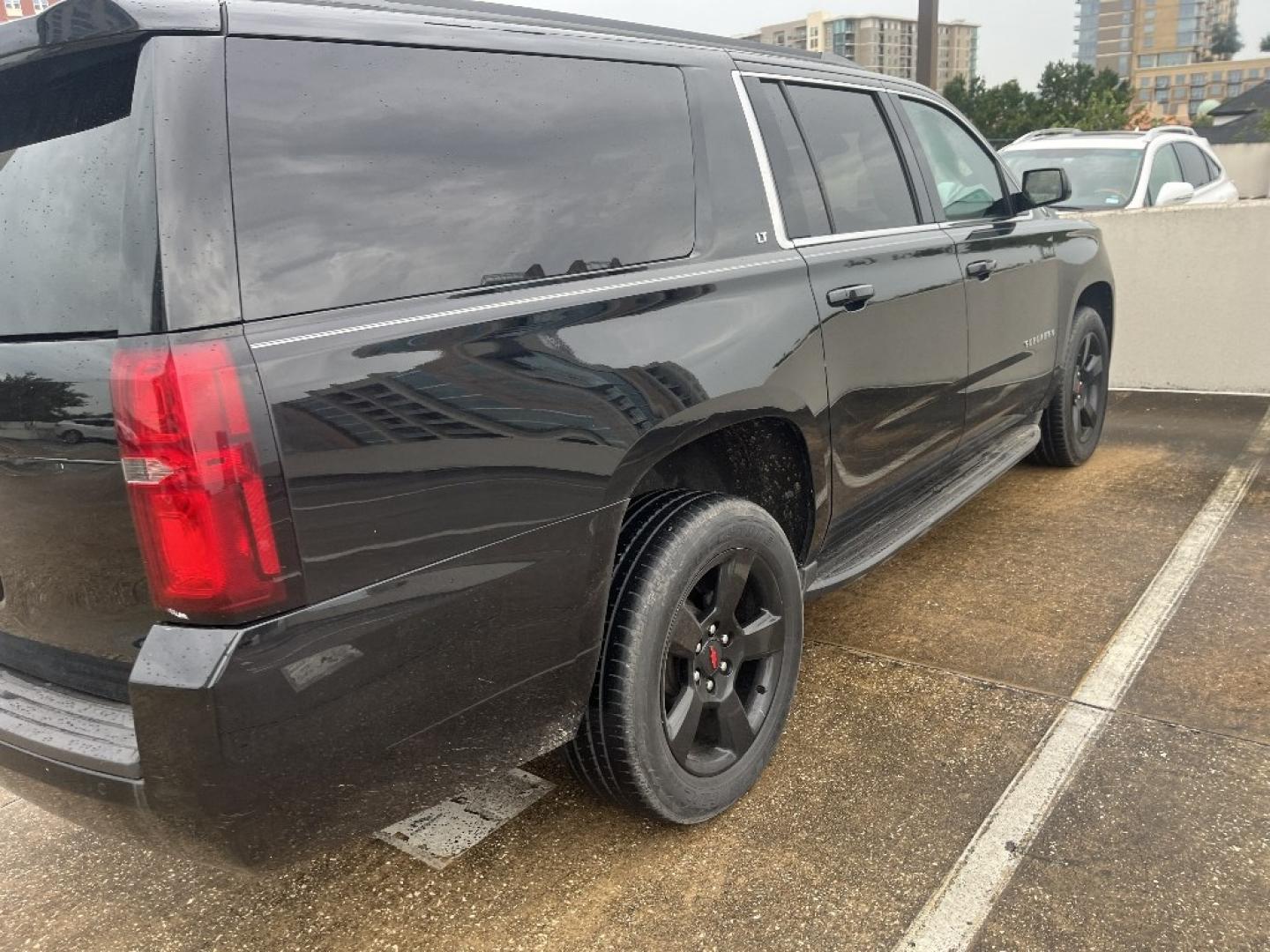 2020 BLACK CHEVROLET SUBURBAN LT 4WD (1GNSKHKC1LR) with an 5.3L V8 OHV 16V engine, AUTOMATIC transmission, located at 2303 West Mt. Houston, Houston, 77038, (281) 507-3956, 29.771597, -95.339569- Photo#1