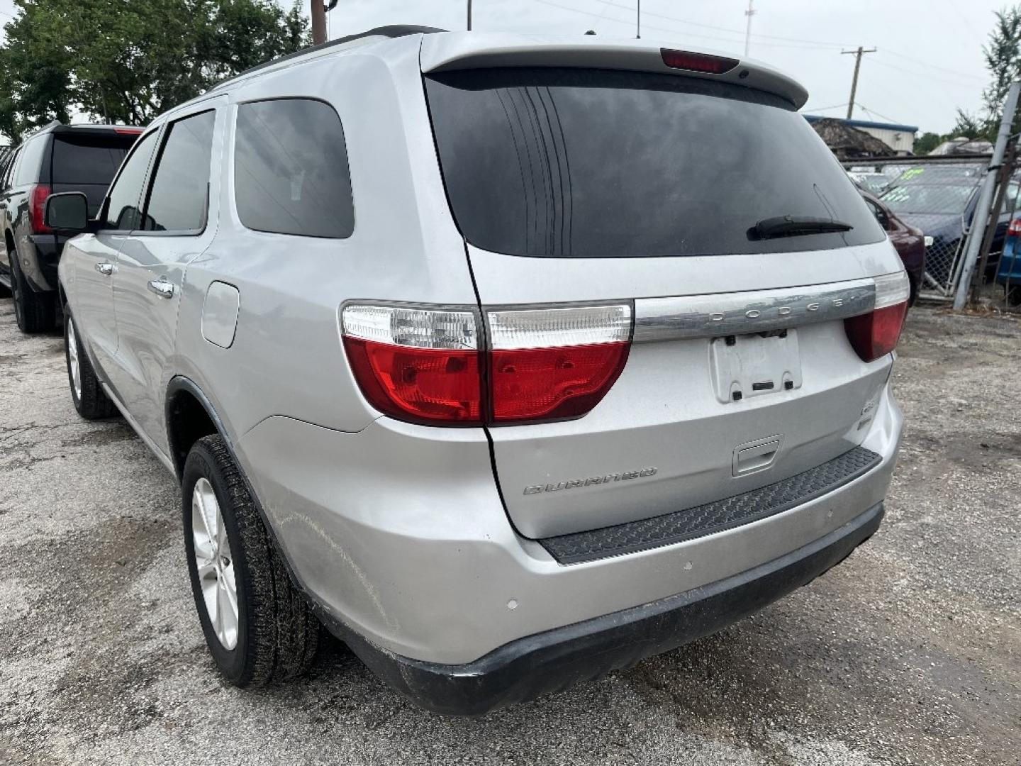 2012 GRAY DODGE DURANGO Crew 2WD (1C4RDHDG9CC) with an 3.6L V6 DOHC 24V engine, AUTOMATIC transmission, located at 2303 West Mt. Houston, Houston, 77038, (281) 507-3956, 29.771597, -95.339569- Photo#1