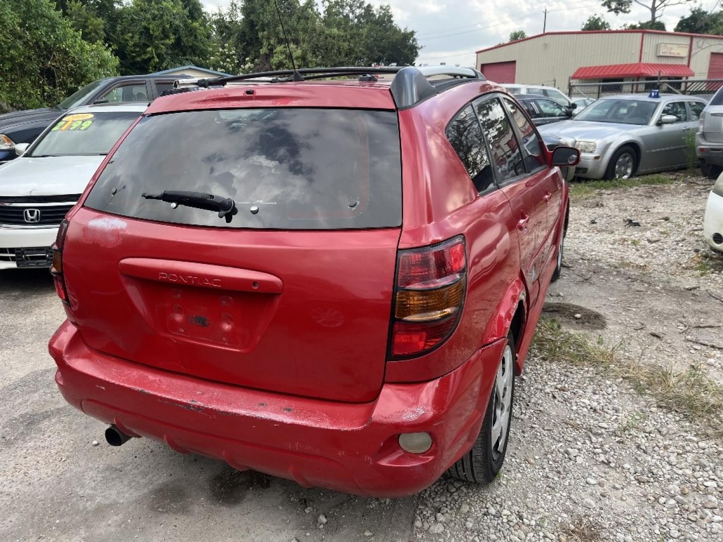 2006 RED /BROWN PONTIAC VIBE Base (5Y2SL65866Z) with an 1.8L L4 DOHC 16V engine, AUTOMATIC transmission, located at 2303 West Mt. Houston, Houston, 77038, (281) 507-3956, 29.771597, -95.339569- Photo#3