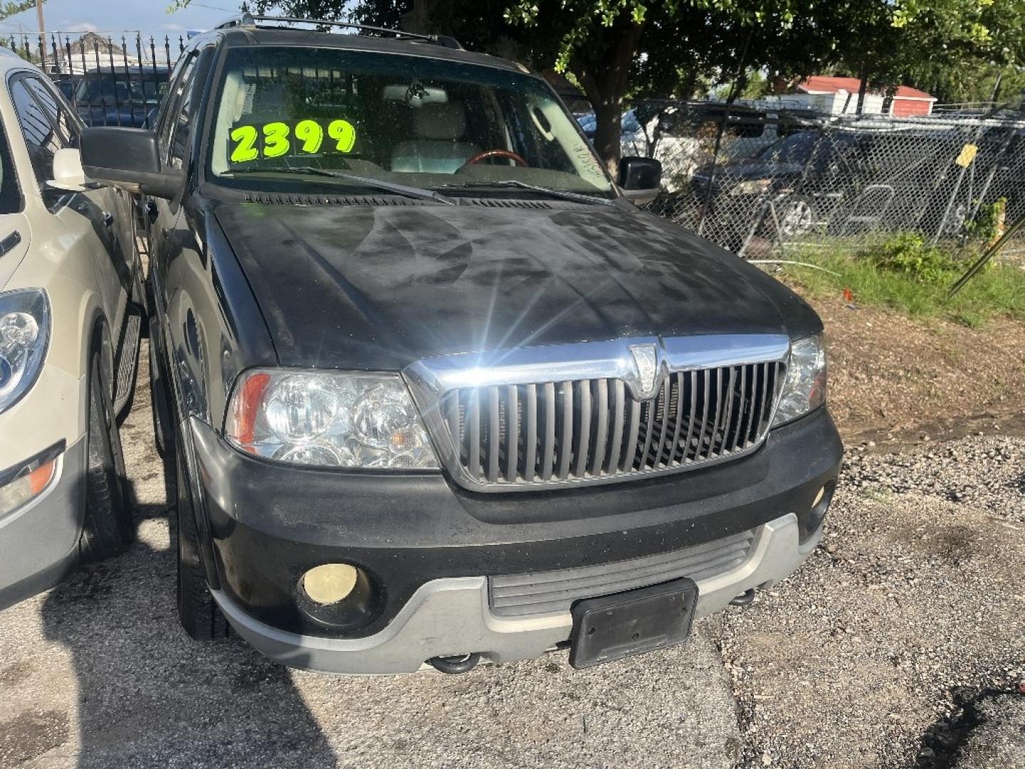 2004 BLACK /BLACK LINCOLN NAVIGATOR Luxury 2WD (5LMFU27R94L) with an 5.4L V8 DOHC 32V engine, AUTOMATIC transmission, located at 2303 West Mt. Houston, Houston, 77038, (281) 507-3956, 29.771597, -95.339569- Photo#1