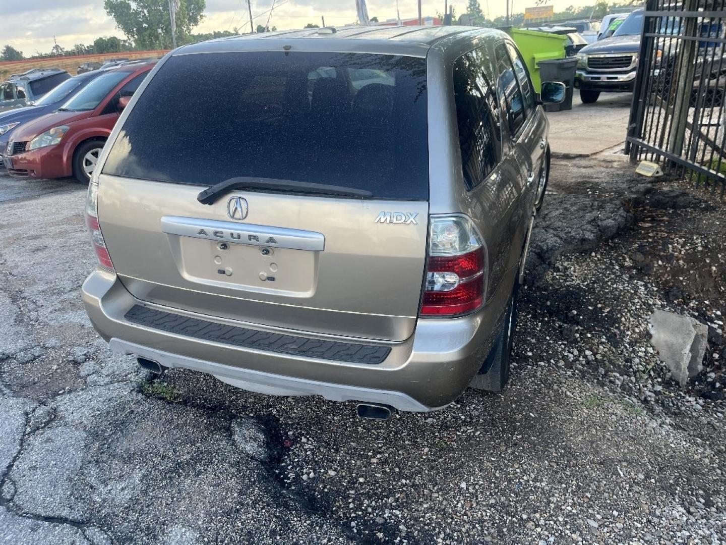 2006 BROWN /BROWN ACURA MDX Premium (2HNYD18296H) with an 3.5L V6 SOHC 24V engine, AUTOMATIC transmission, located at 2303 West Mt. Houston, Houston, 77038, (281) 507-3956, 29.771597, -95.339569- Photo#1
