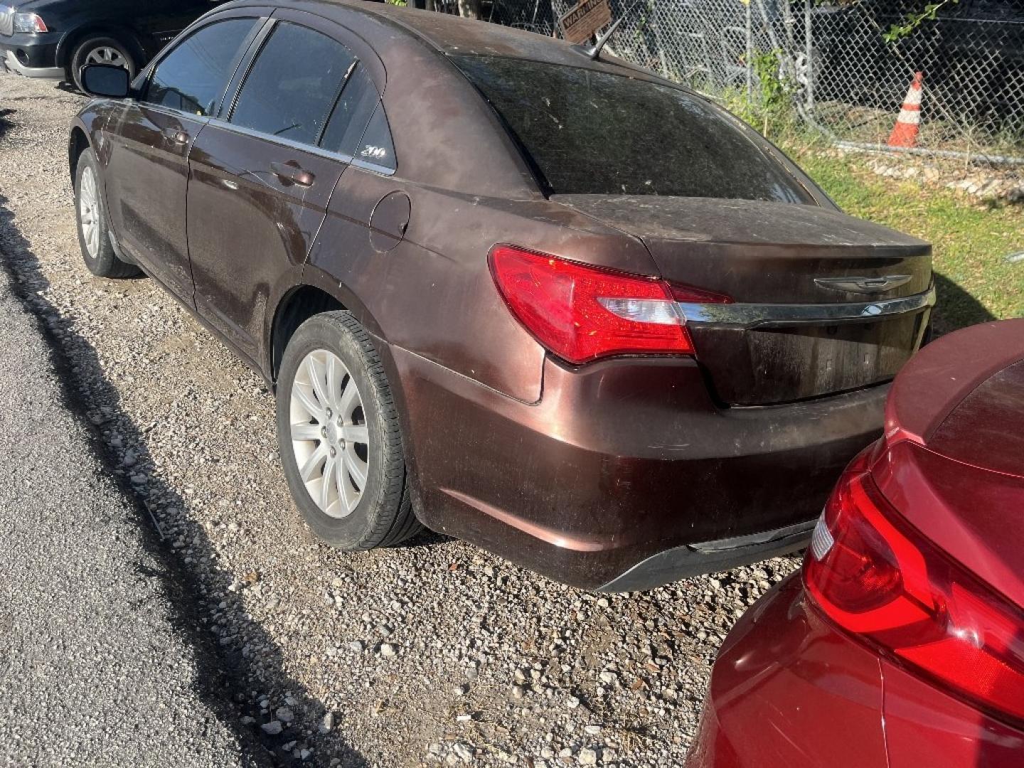 2013 BROWN /BROWN CHRYSLER 200 Touring (1C3CCBBB2DN) with an 2.4L L4 DOHC 16V engine, AUTOMATIC transmission, located at 2303 West Mt. Houston, Houston, 77038, (281) 507-3956, 29.771597, -95.339569- Photo#2