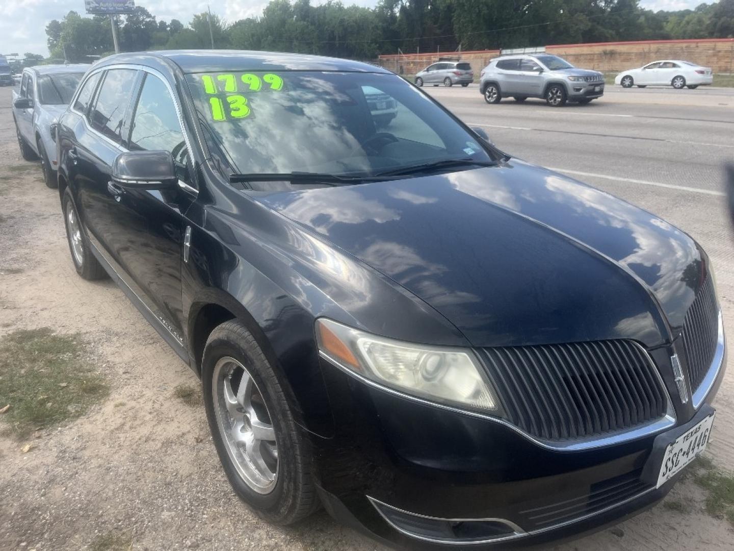 2013 BLACK /BLACK LINCOLN MKT Livery FWD (2LMGJ5M97DB) with an 2.0L L4 DOHC 16V engine, AUTOMATIC transmission, located at 2303 West Mt. Houston, Houston, 77038, (281) 507-3956, 29.771597, -95.339569- Photo#0