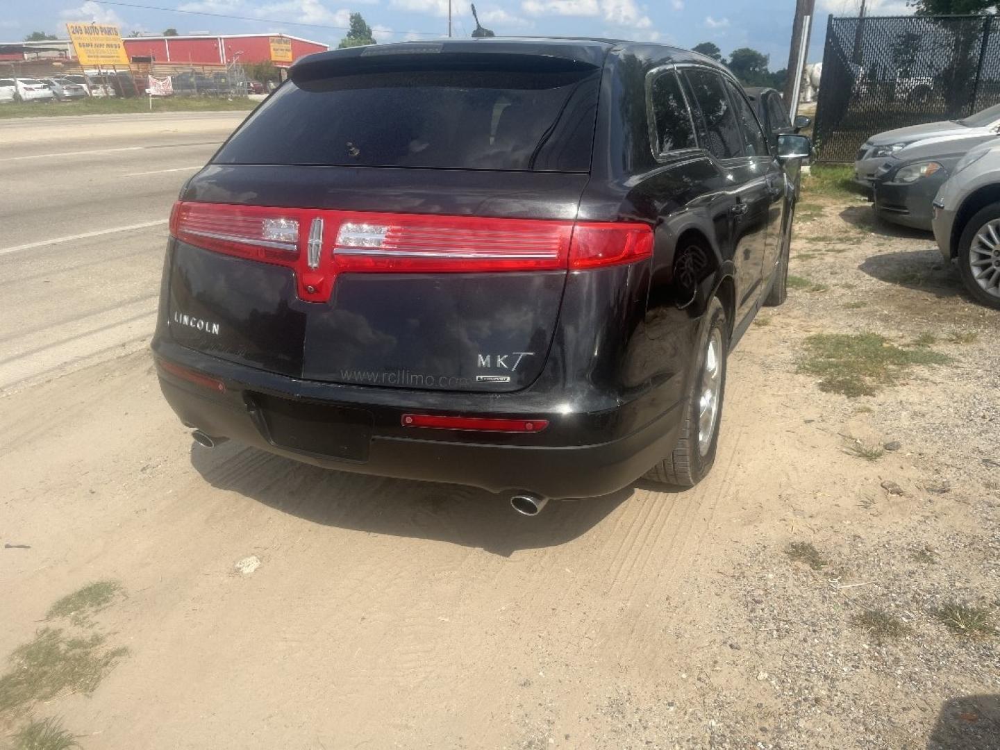 2013 BLACK /BLACK LINCOLN MKT Livery FWD (2LMGJ5M97DB) with an 2.0L L4 DOHC 16V engine, AUTOMATIC transmission, located at 2303 West Mt. Houston, Houston, 77038, (281) 507-3956, 29.771597, -95.339569- Photo#4