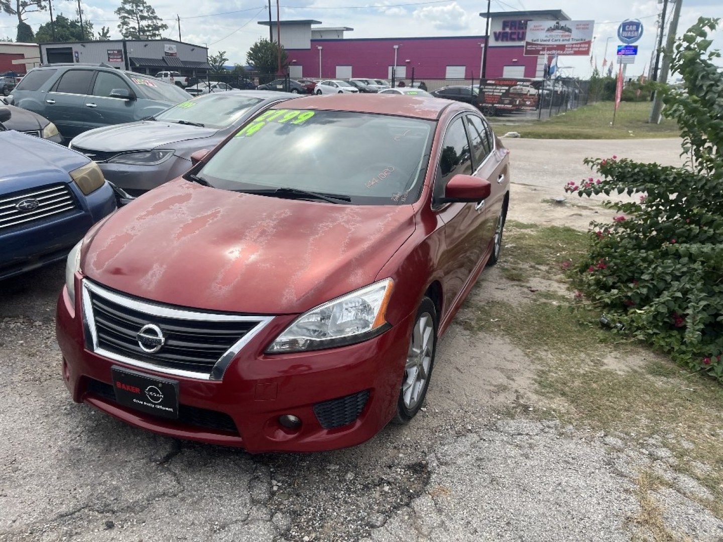 2014 RED /BLACK NISSAN SENTRA S 6MT (3N1AB7AP7EY) with an 1.8L L4 SFI DOHC 16V engine, AUTOMATIC transmission, located at 2303 West Mt. Houston, Houston, 77038, (281) 507-3956, 29.771597, -95.339569- Photo#0