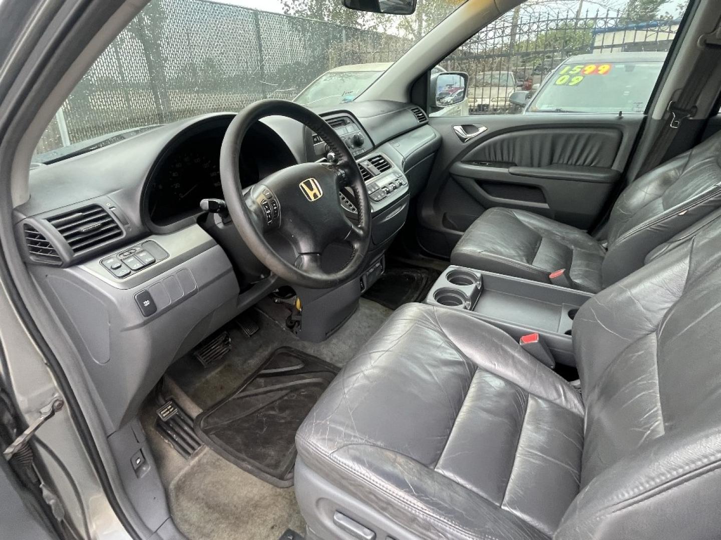 2006 GRAY /GRAY HONDA ODYSSEY EX-L (5FNRL386X6B) with an 3.5L V6 SOHC 24V engine, AUTOMATIC transmission, located at 2303 West Mt. Houston, Houston, 77038, (281) 507-3956, 29.771597, -95.339569- Photo#1