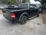 2005 BLACK FORD F-150 Lariat SuperCrew 2WD (1FTPW12535K) with an 5.4L V6 SOHC 16V engine, AUTOMATIC transmission, located at 2303 West Mt. Houston, Houston, 77038, (281) 507-3956, 29.771597, -95.339569- Photo#1